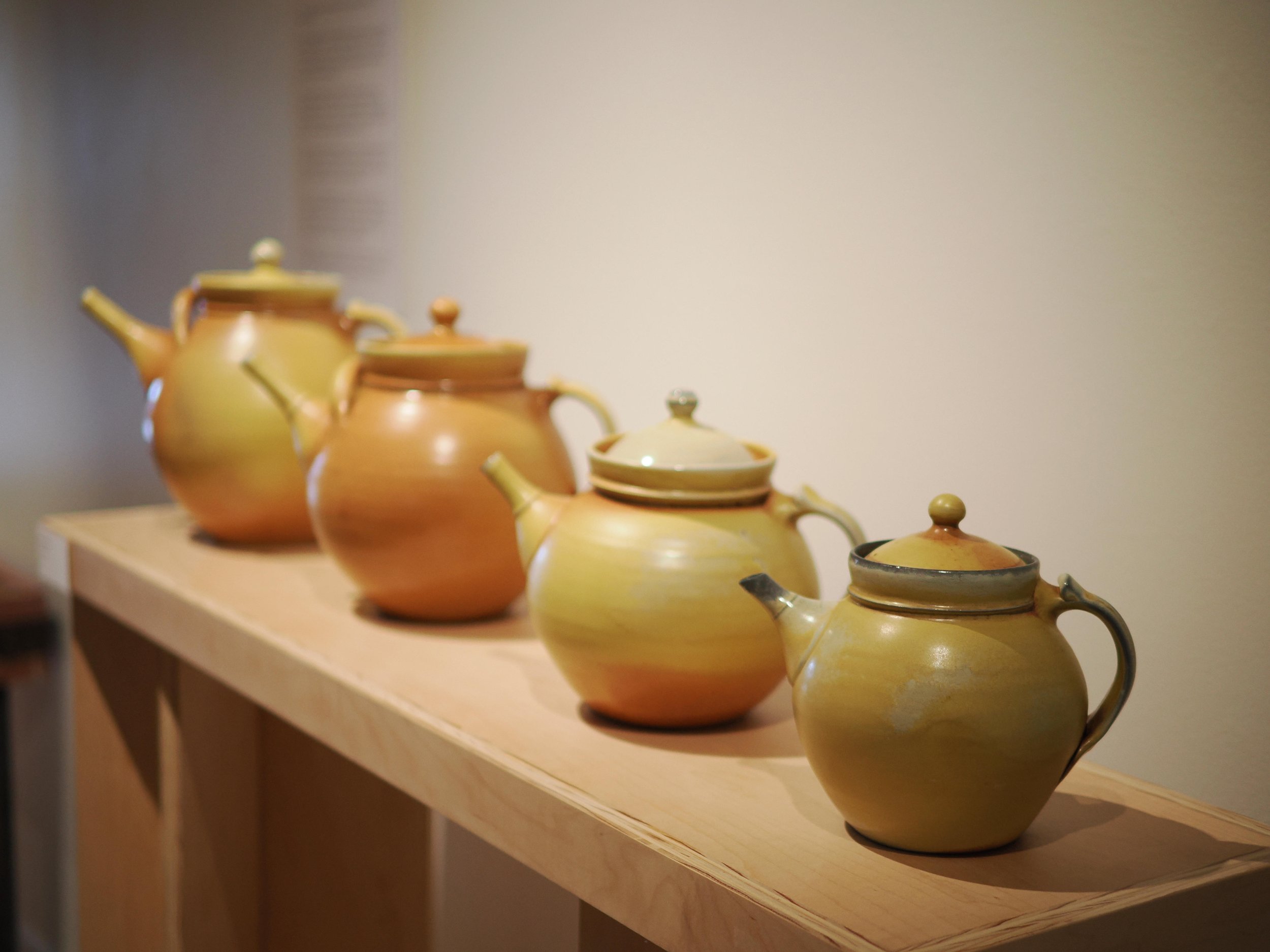 Brigade of yellow teapots.jpg