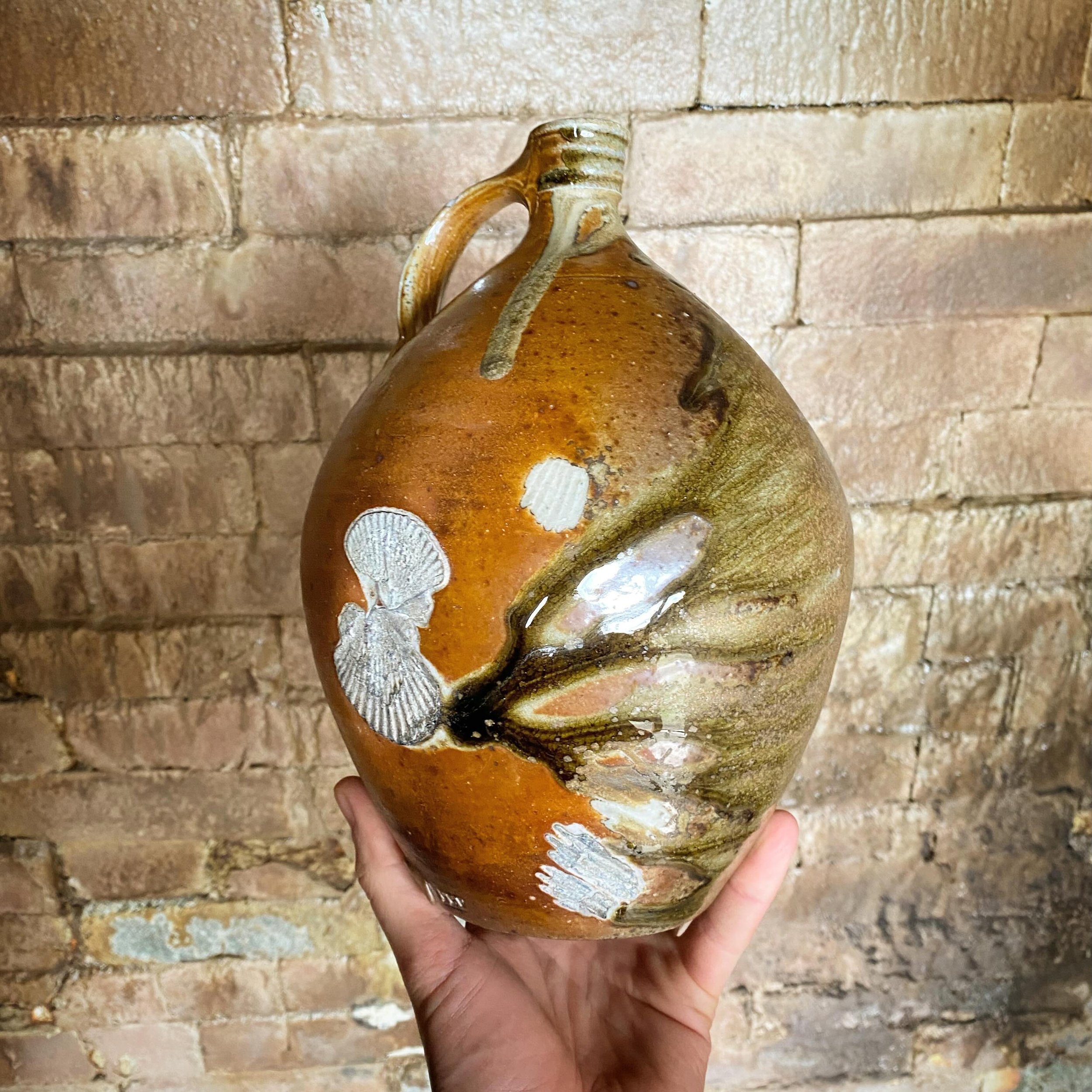 Here&rsquo;s that cider jar I posted a week or so ago. It was fired on top of sea shells on the top shelf of the front stack of the train kiln. Very pleased with how it came out!