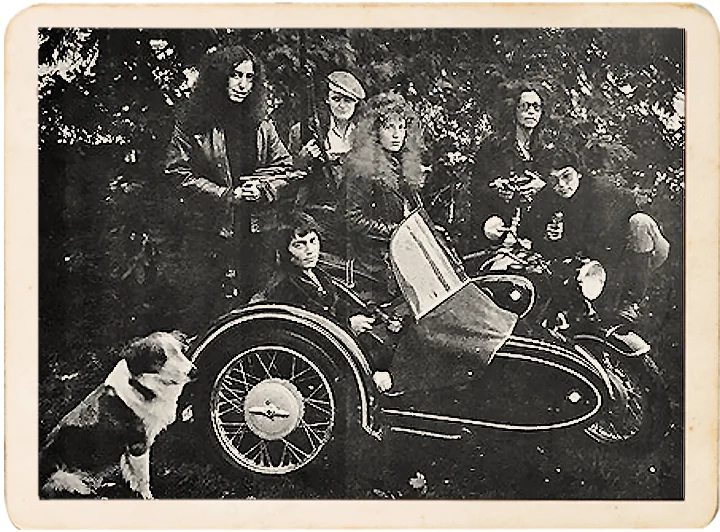 That’s Rita Mae Brown in the jumpseat, Ellen Oppenheimer to the left – she made the glass guns – Jane Meyers to her right, holding her real gun. That’s me, second from right, with my much-prized glass machine gun, which unfortunately is now gone. Well, it was 1973....