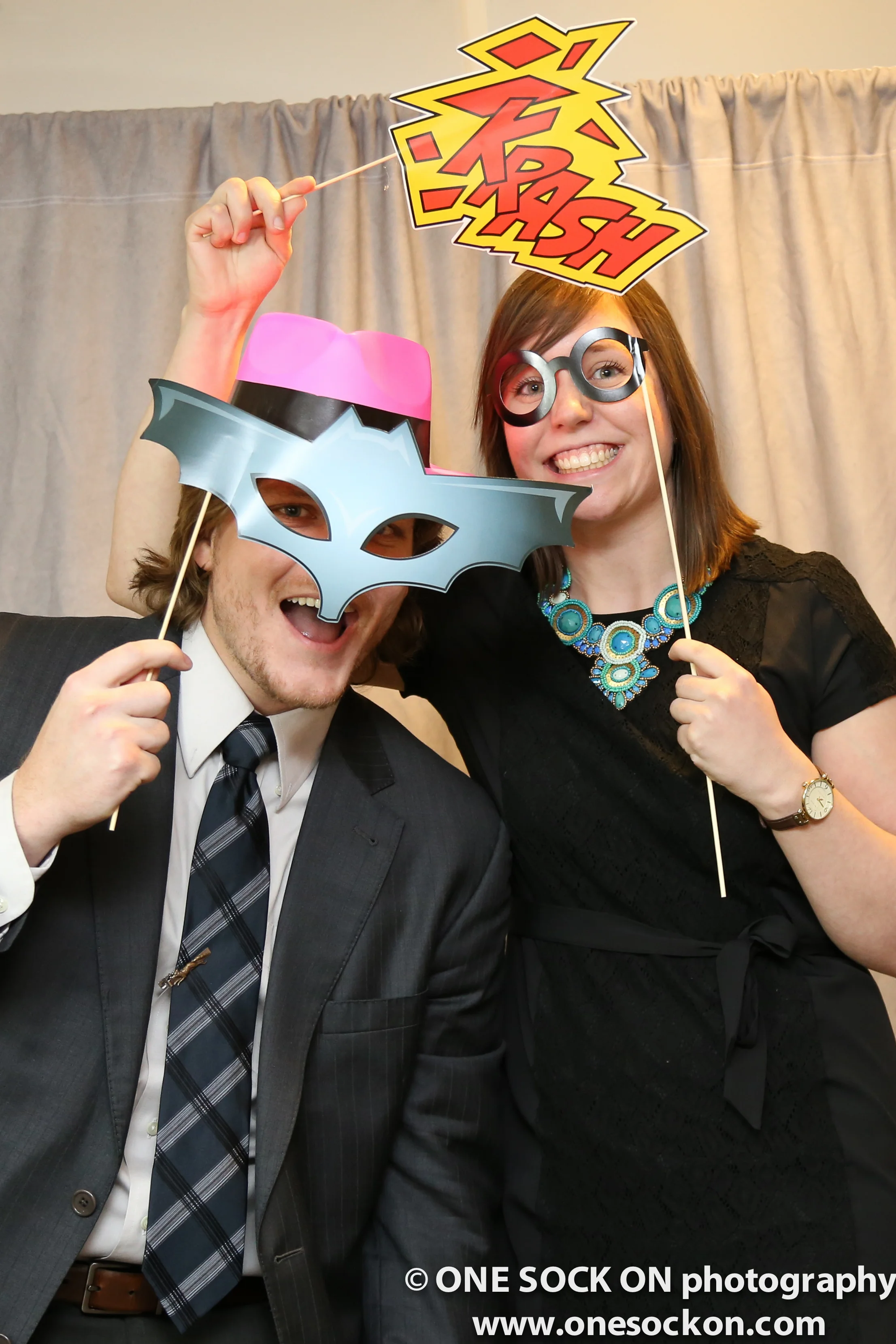 photobooth with comic book masks and props