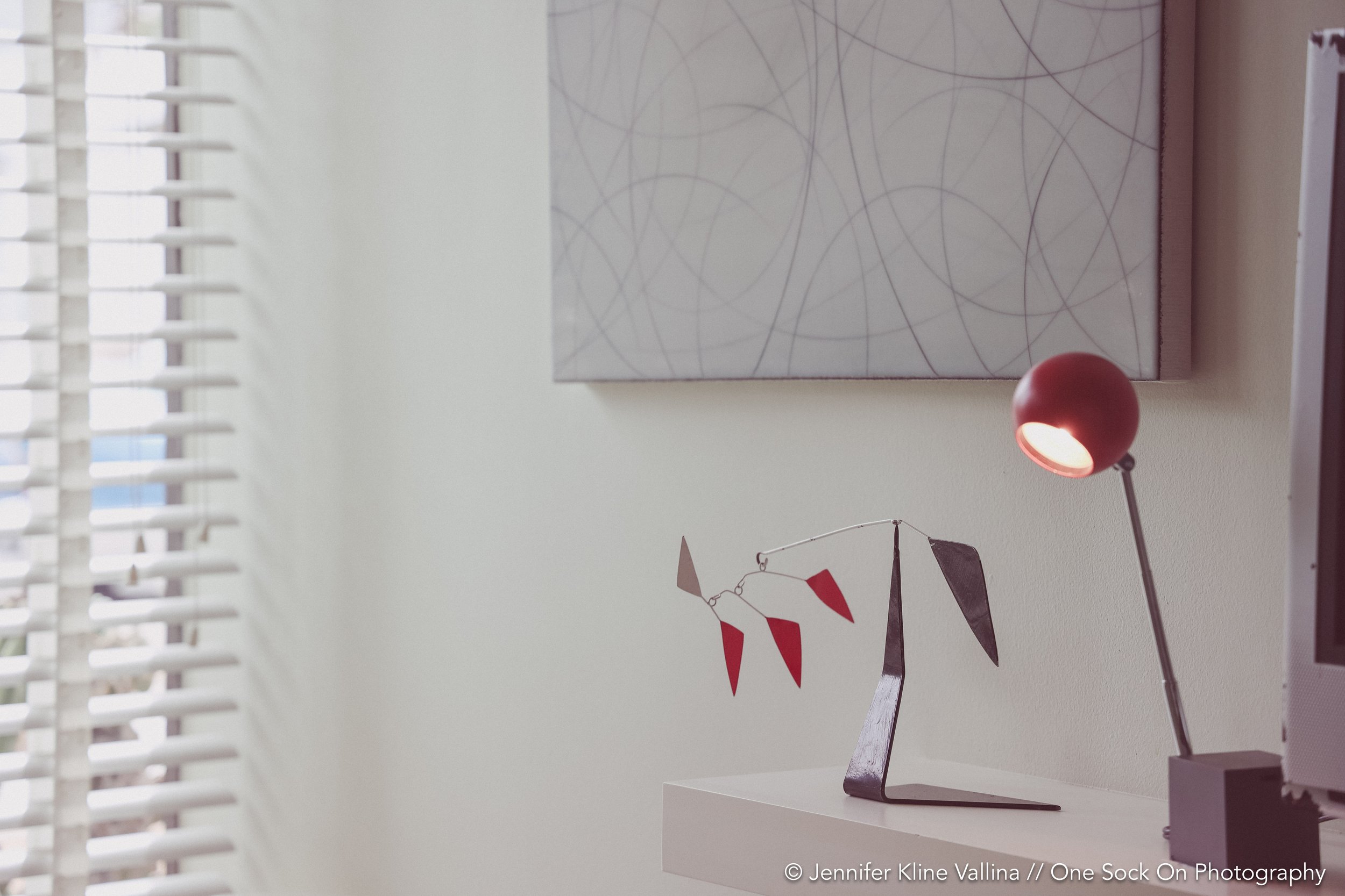 geometric art piece on side table