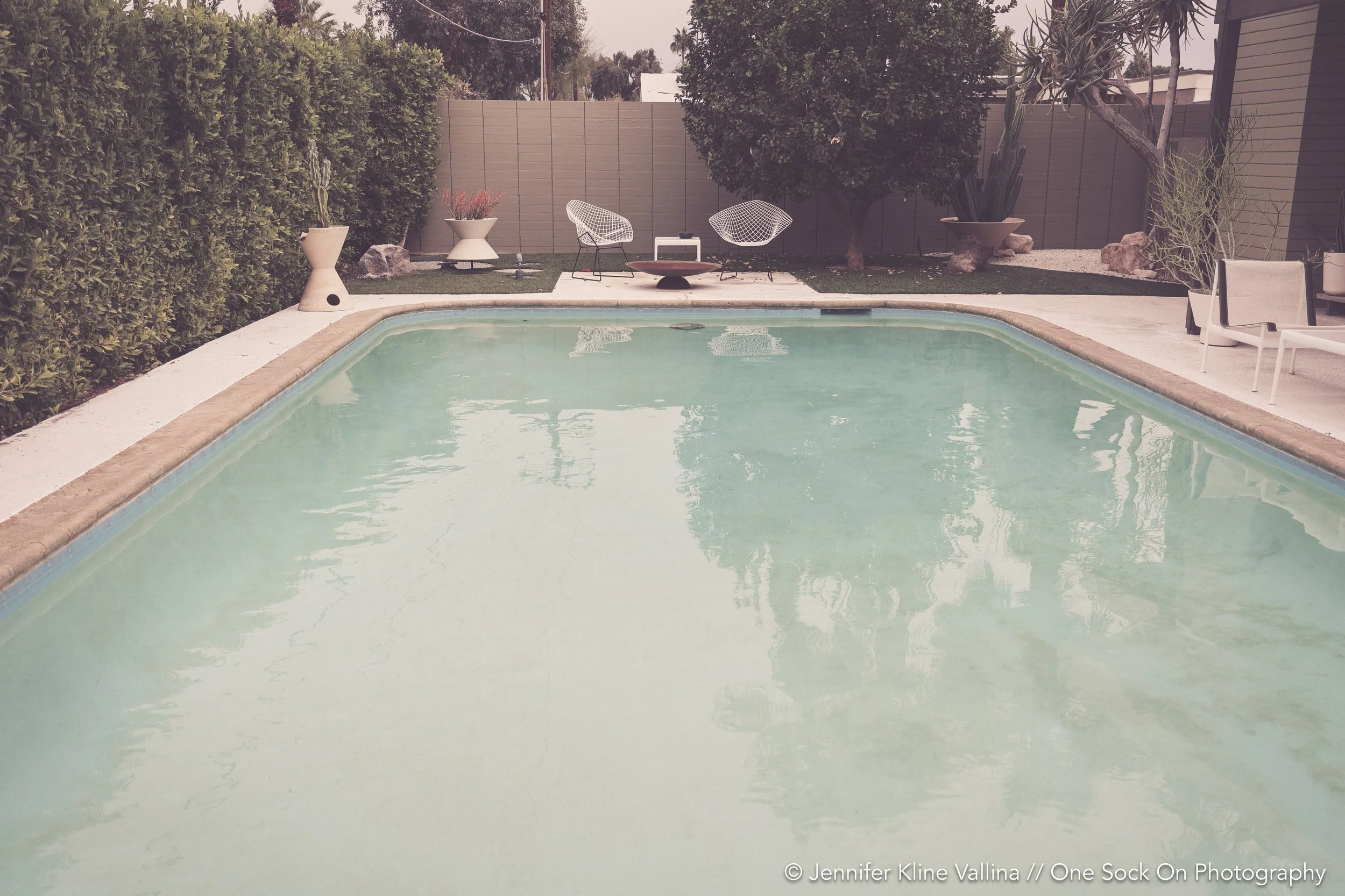 backyard pool palm springs nami chairs saarinen tulip chairs mykonos chairs 