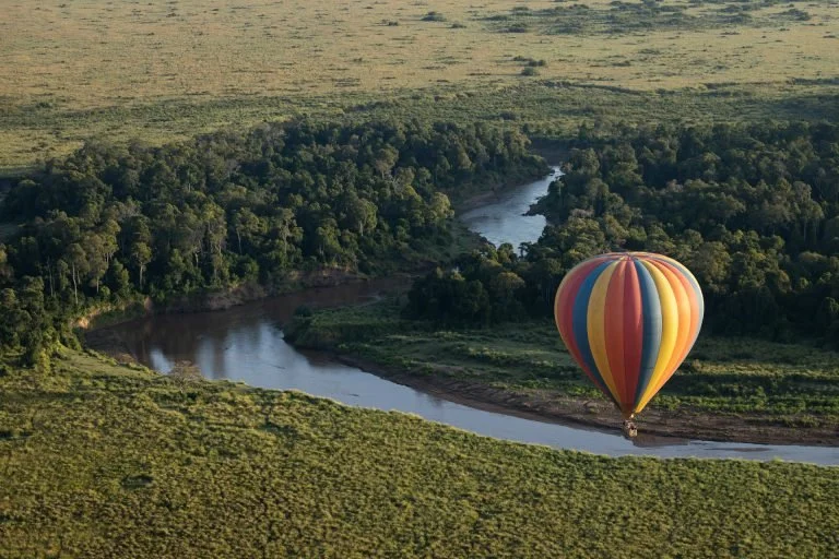 Hot Air Balloon Floating over the Mara River.jpeg