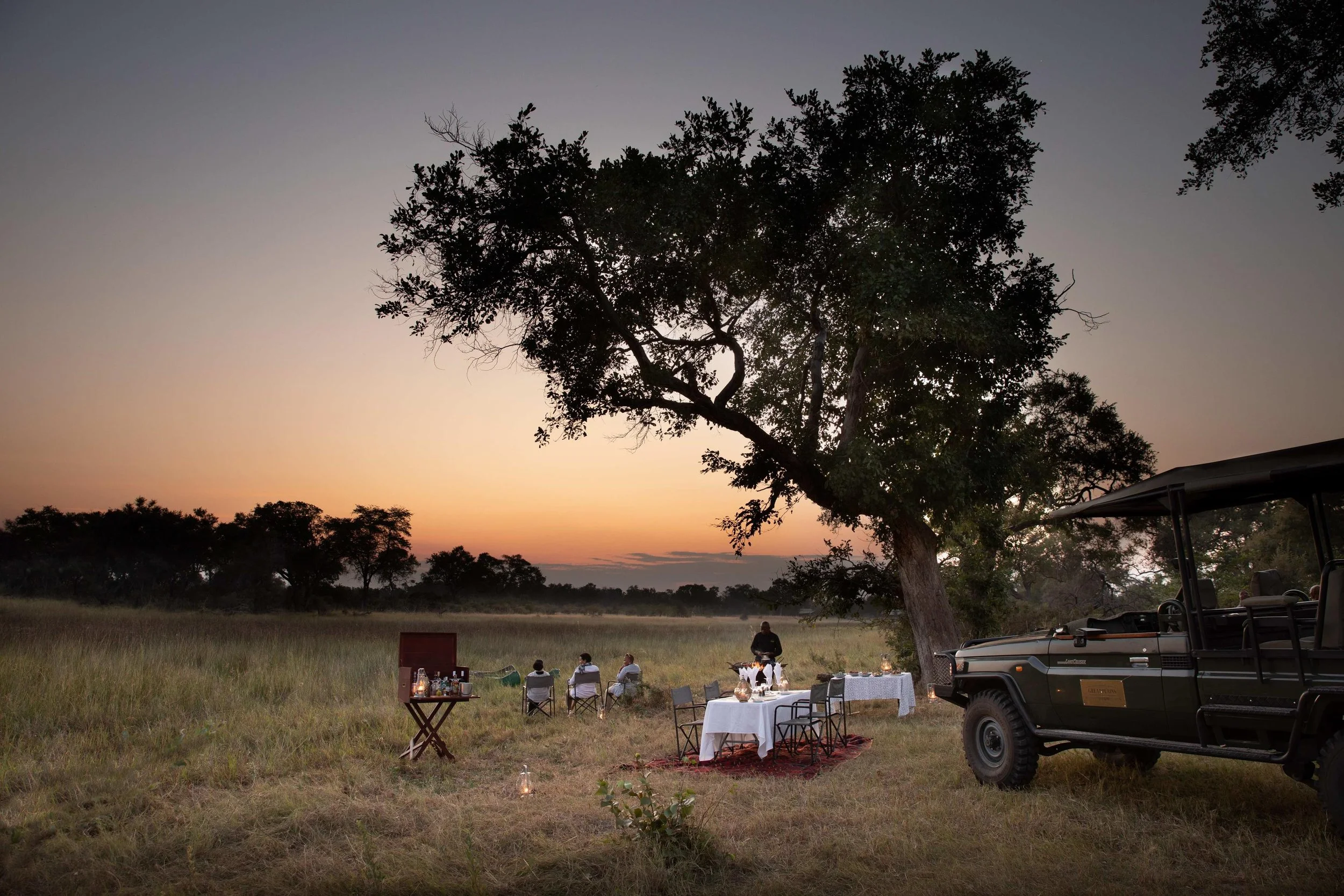 Sundowners at Okavango Explorers Camp.jpg