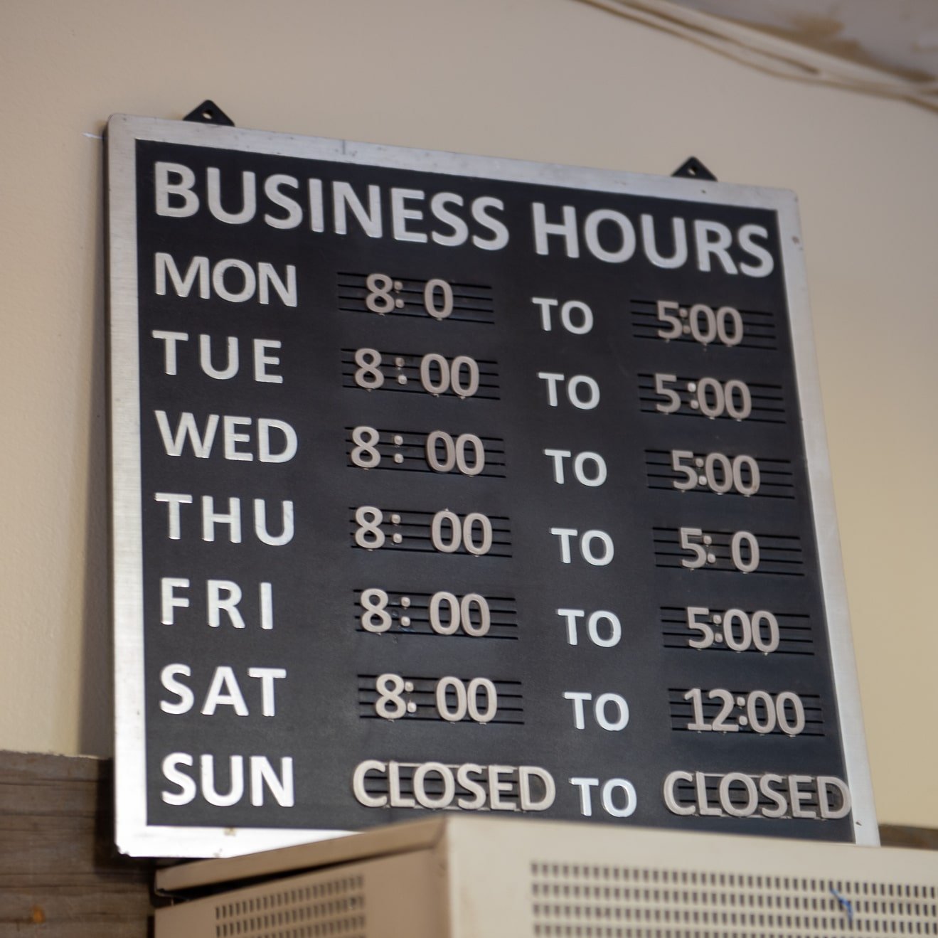 Business Hours Sign-min.jpeg