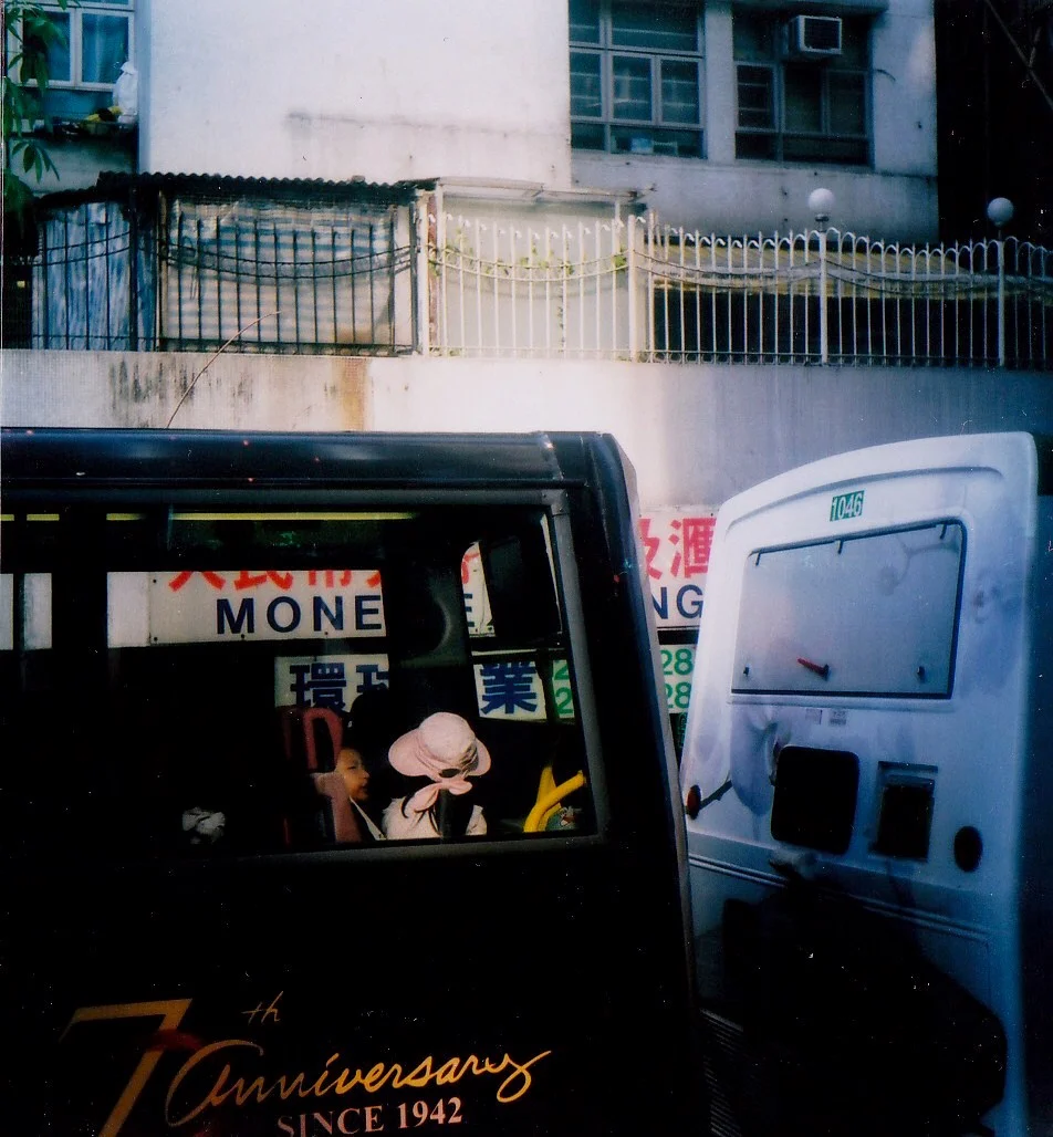 Pink Hat in a Double Decker Bus, Hong Kong, 2014