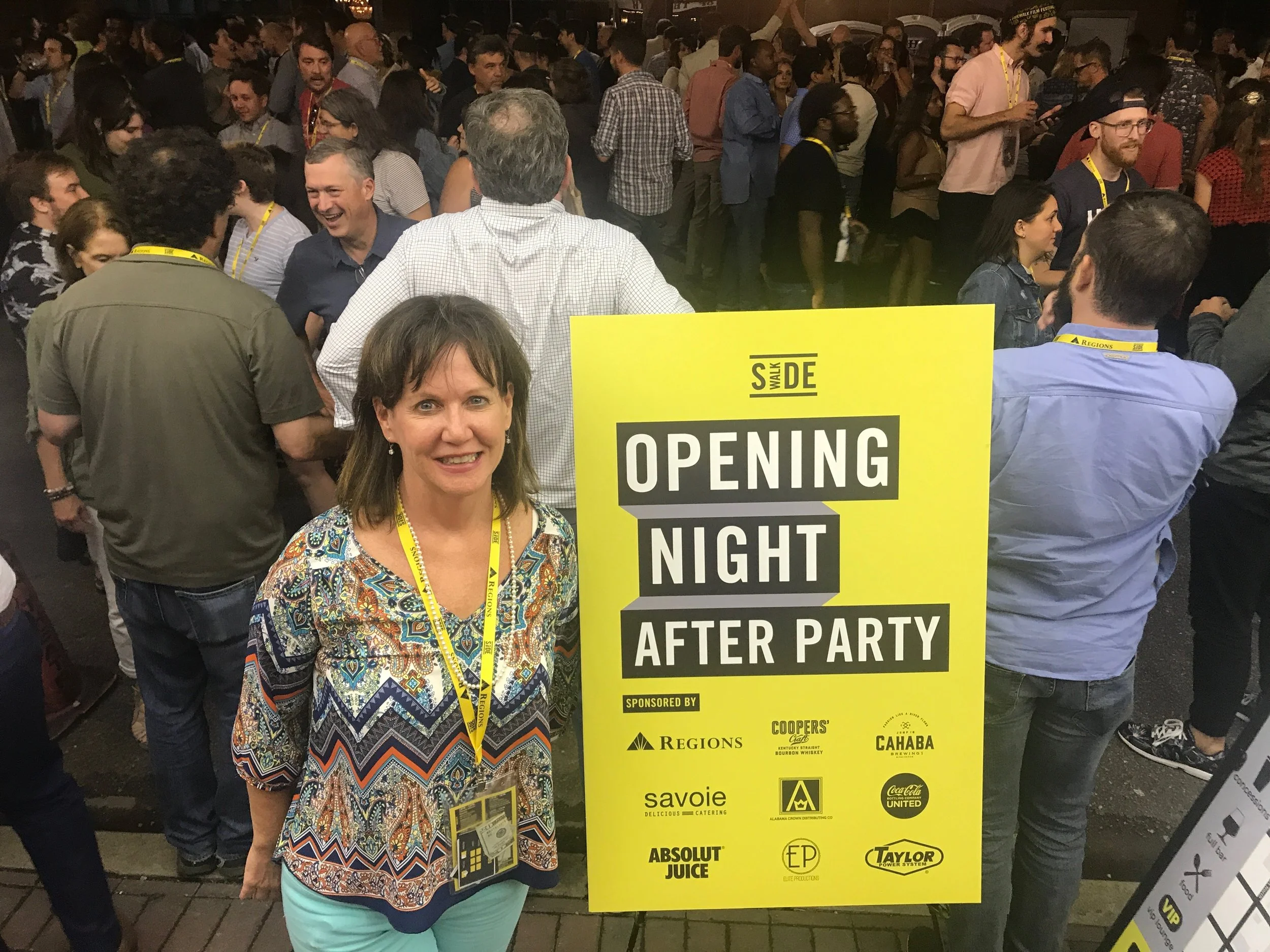 My mom, Kathleen, attending the Opening Night After Party that took up an entire block of downtown Birmingham.
