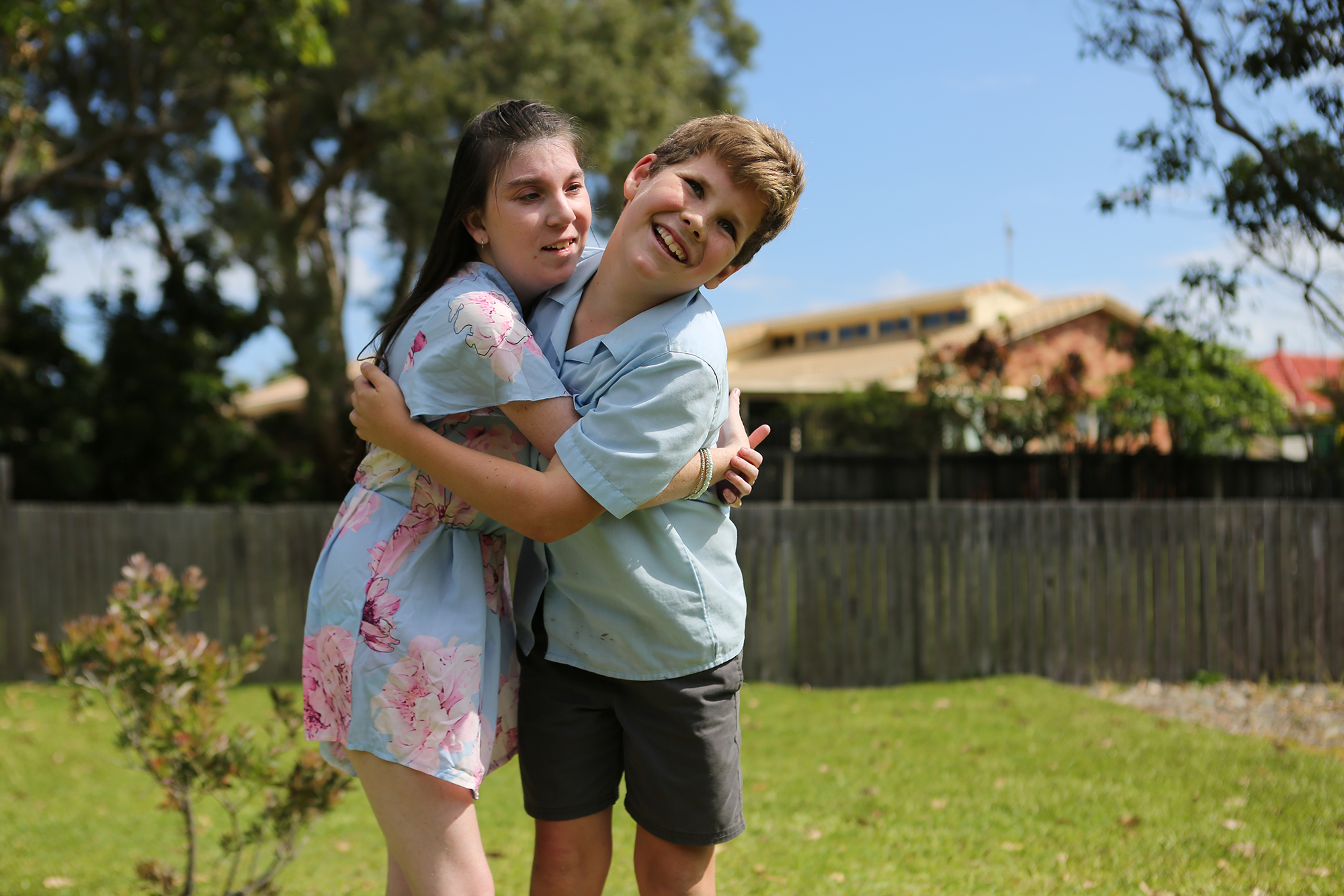 Tanisha has a rare genetic disorder which has resulted in intellectual and physical disabilities. Her younger brother Harley helps his mother take care of her. Featured in The Guardian Australia