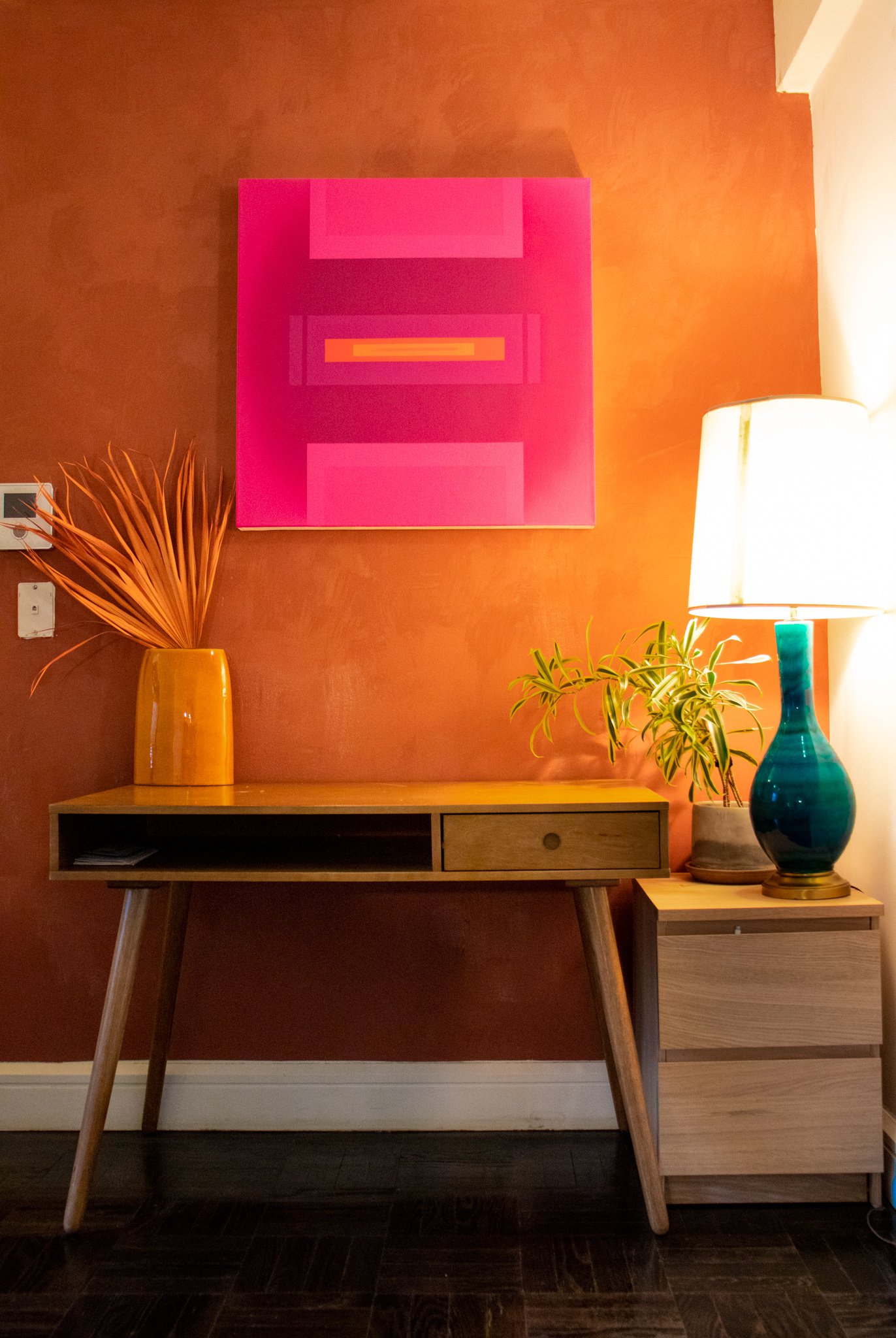 In this project I sought to transform my working area. For me, it was key to create an invigorating and functional workspace to maximize my use of the area. However, since this was in my living room, I wanted it to blend in aesthetically