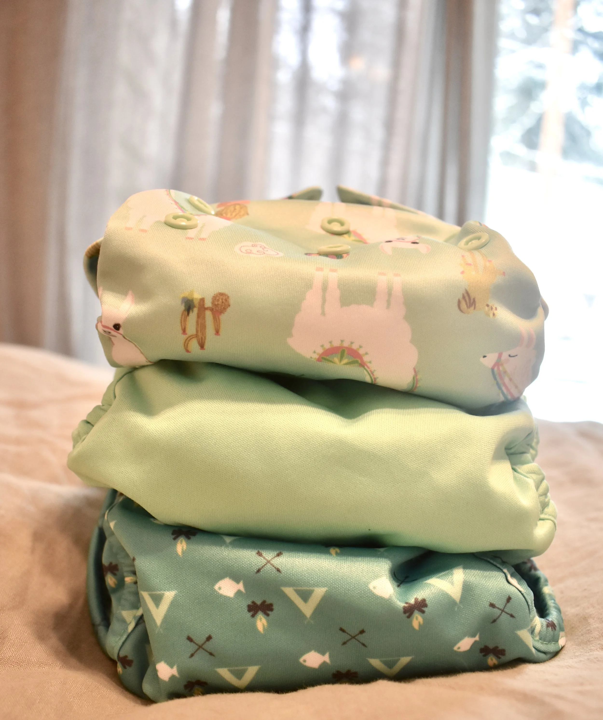 Covers, stuffed and ready to go (top to bottom: luludew , rumparooz , and petite crown )