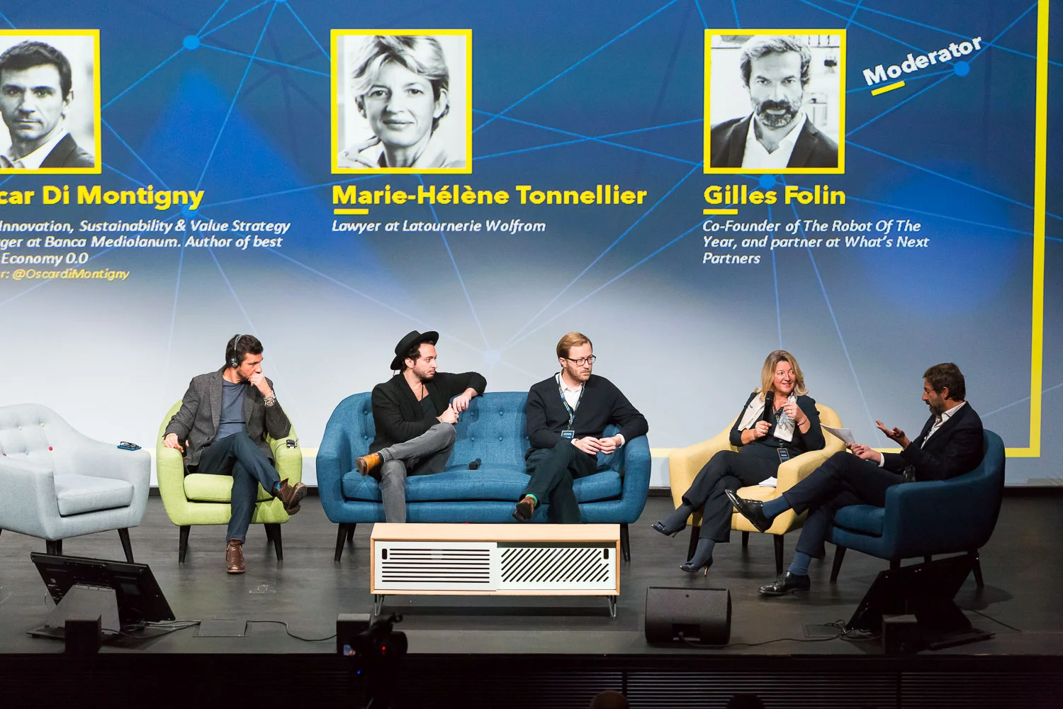 PANEL FOUNDING A BETTER FUTURE FOR HUMANS WITH AI AND ROBOTS Speakers : Oscar Di Montigny – Chief Innovation, Sustainability & Value Strategy Manager at Banca Mediolanum . Author of best seller Economy 0.0, Rand Hindi - Data scientist and CEO of Snips, Pierre Lebeau - Founder at Keecker, Marie-Hélène Tonnellier - Lawyer at Latournerie WolfromP - Moderator : Gilles Folin – Co-Founder of The Robot Of The Year, and partner at What’s Next Partners. Photo Svend Andersen