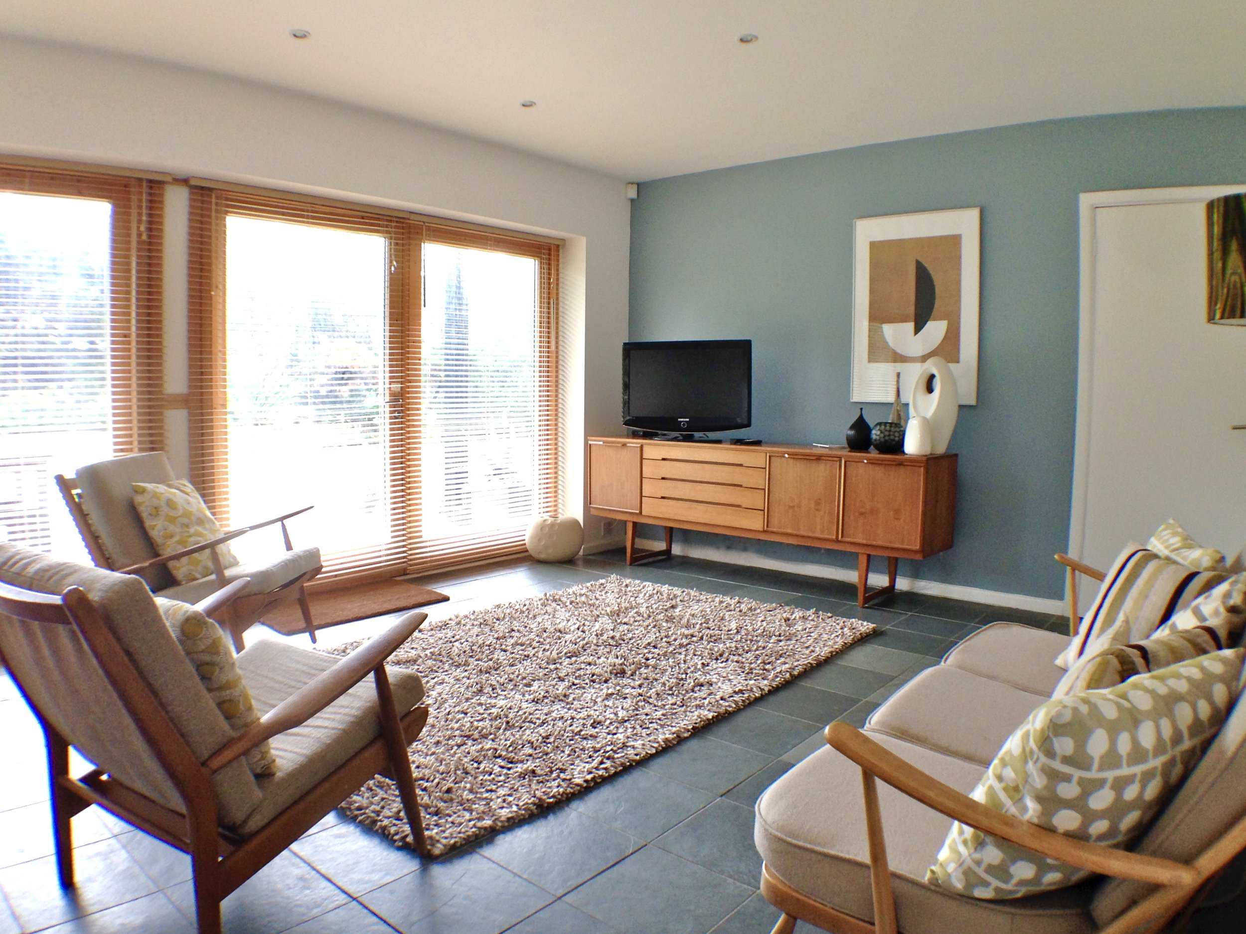 A happy holiday designed for all your needs. Some guests may want to watch a film, chosen from many of our available DVDs in the TV room downstairs. Others may want to lounge in the open plan living area upstairs, chat and listen to music.