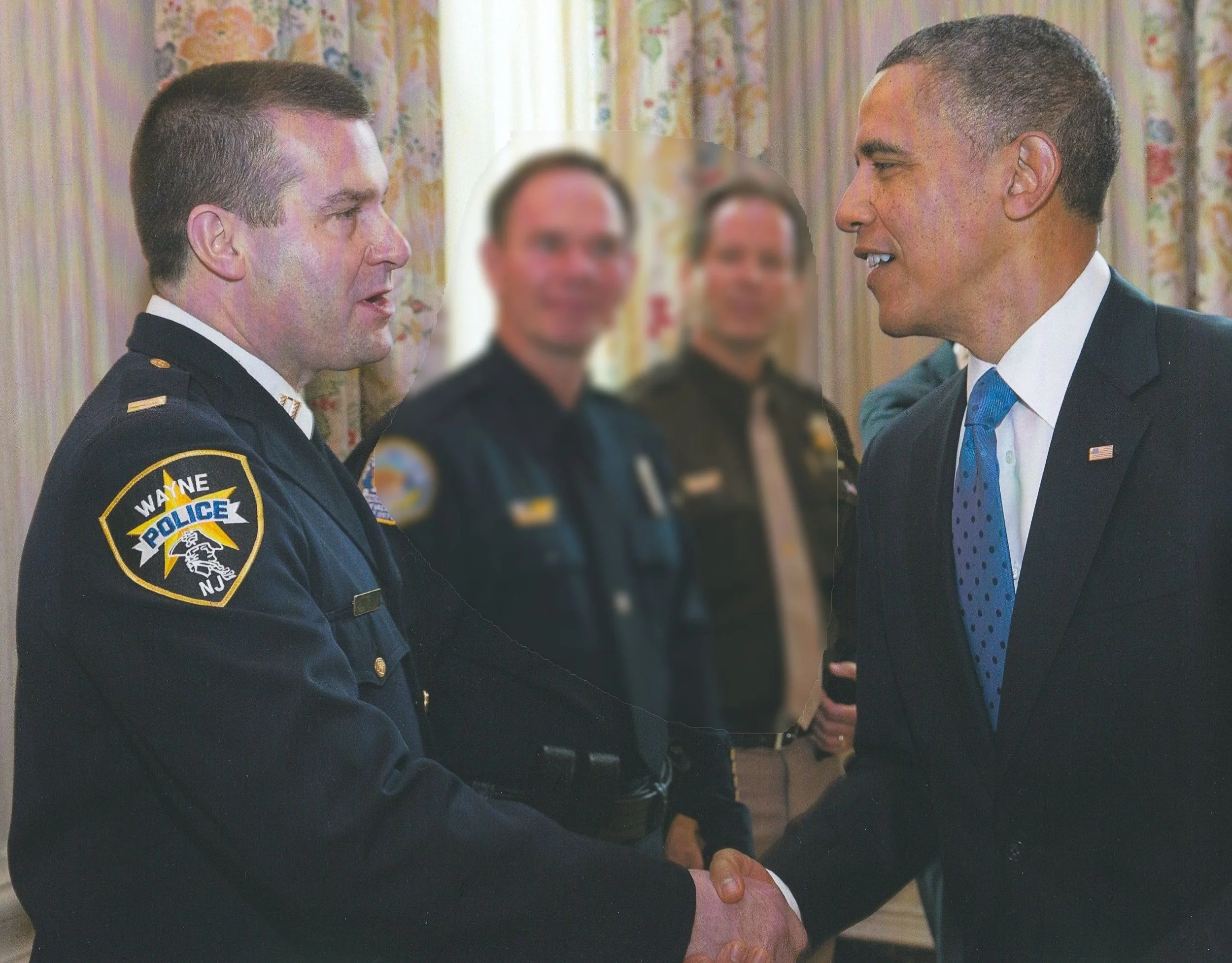 Obama hand shake blur.jpg