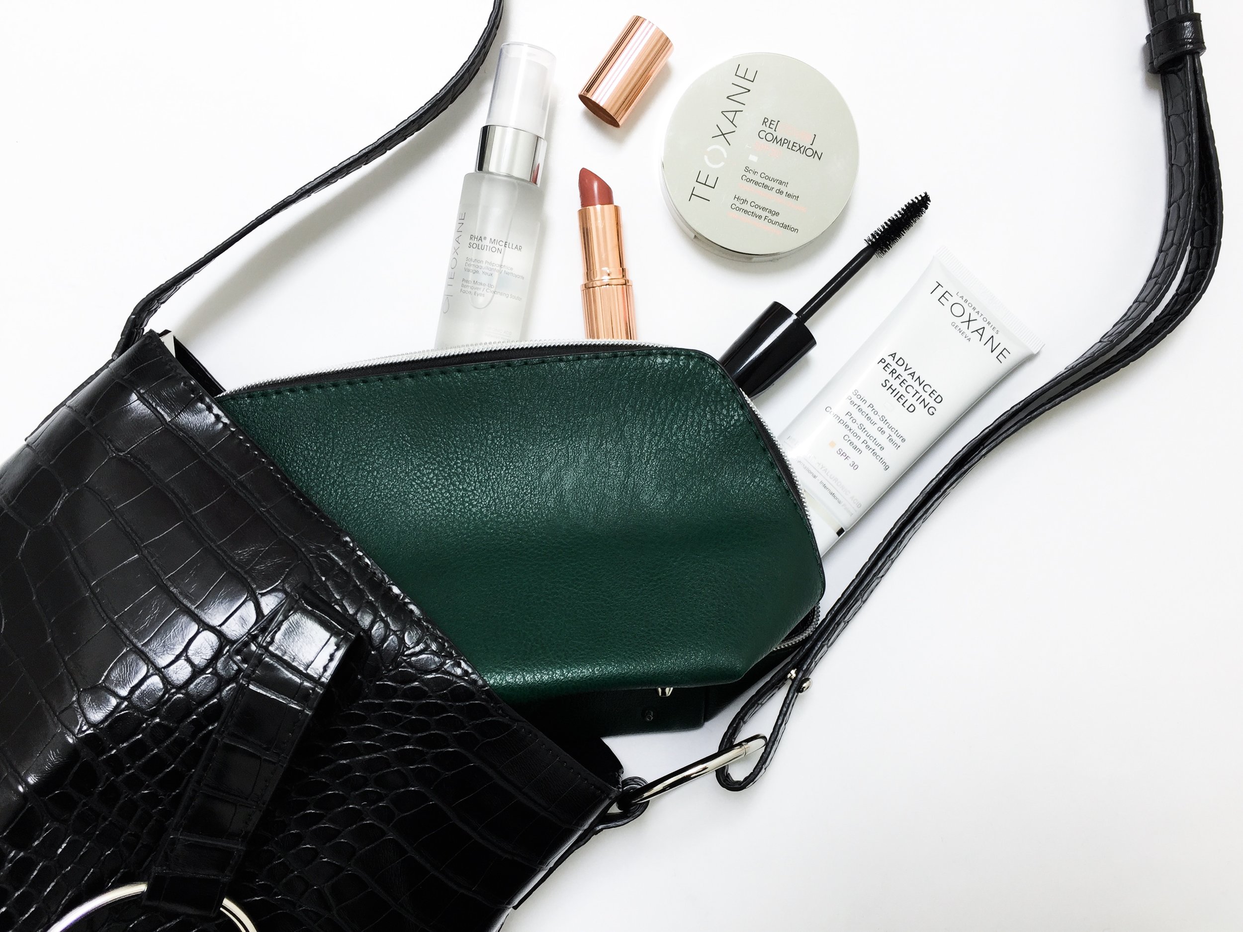 Teoxane Handbag essentials copy.JPG