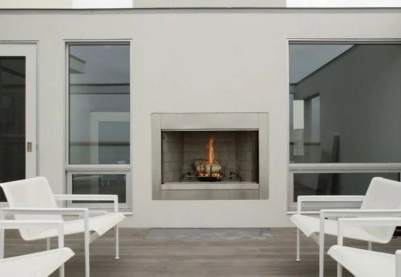 Outdoor wood burning beach-side fireplace