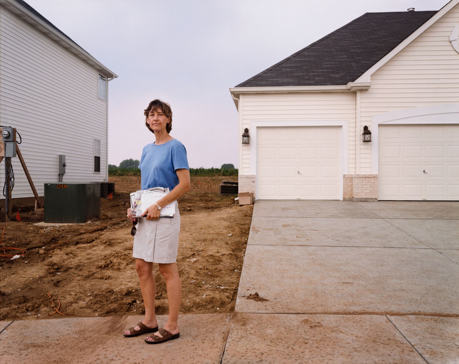 13_A Woman With Mail, Chesterfield, Missouri, June 1999.jpeg
