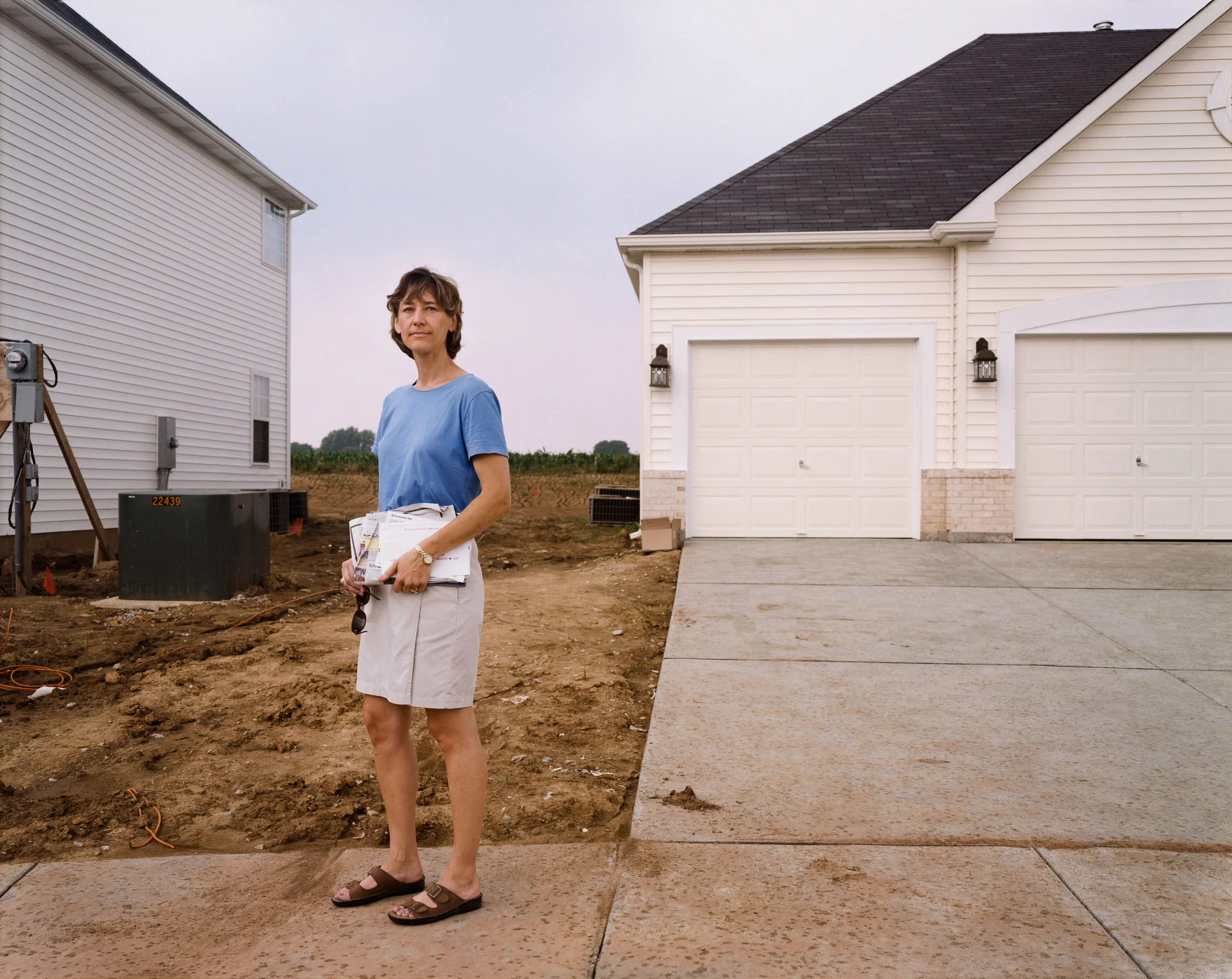 A Woman With Mail, Chesterfield, Missouri, June 1999