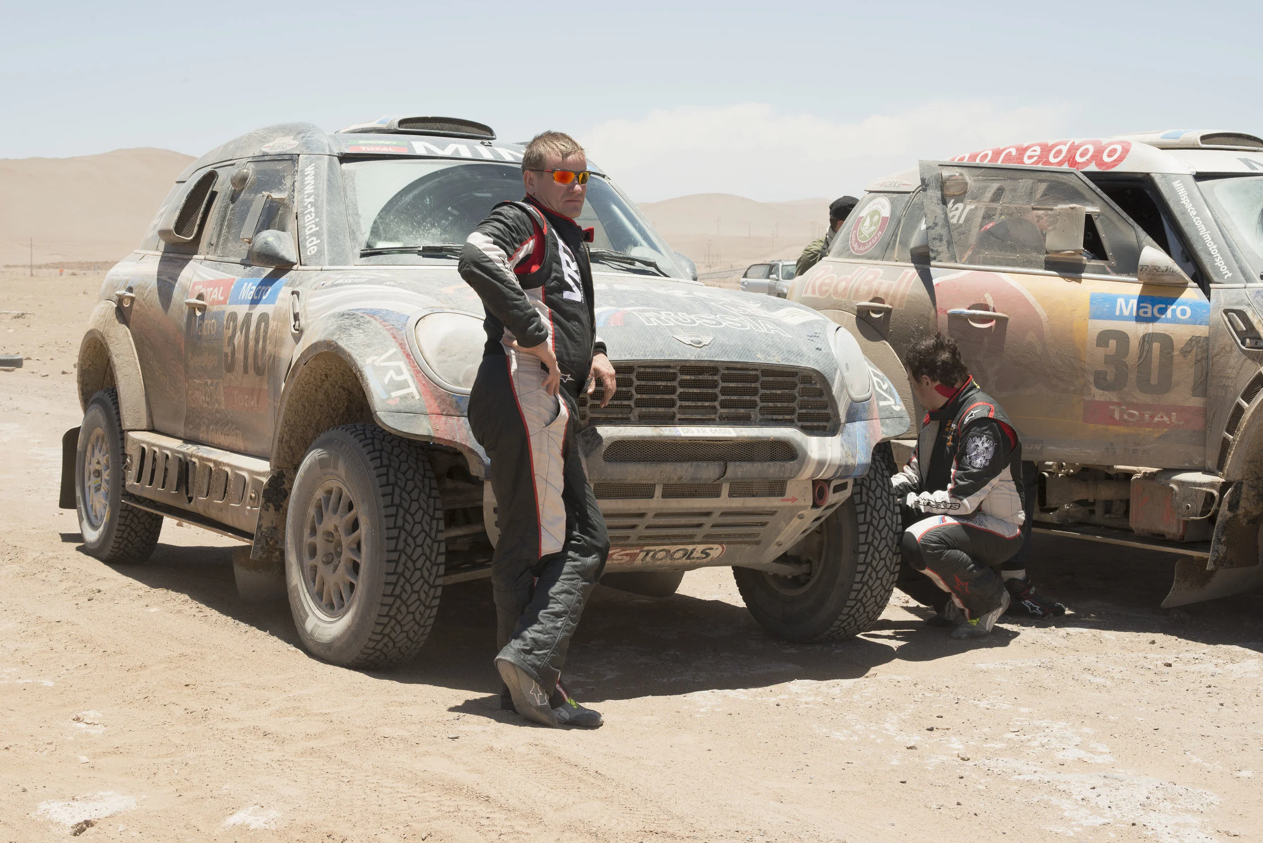 The Paris / Dakar Auto Rally, near Iquieque, Chile This auto race which was run on a course from Paris, France, to Dakar, Senegal, each year now takes place in Chile, Bolivia, and Argentina. Its African route was abandoned after threats of terrorism in Mauritania. The Vatican City newspaper L'Osservatore Romano has called the race a "vulgar display of power and wealth in places where men continue to die from hunger and thirst." Many have also criticized the environmental impact of the race as in the song "500 connards sur la ligne de départ" ("500 Arseholes at the Starting Line") by French singer Renaud.