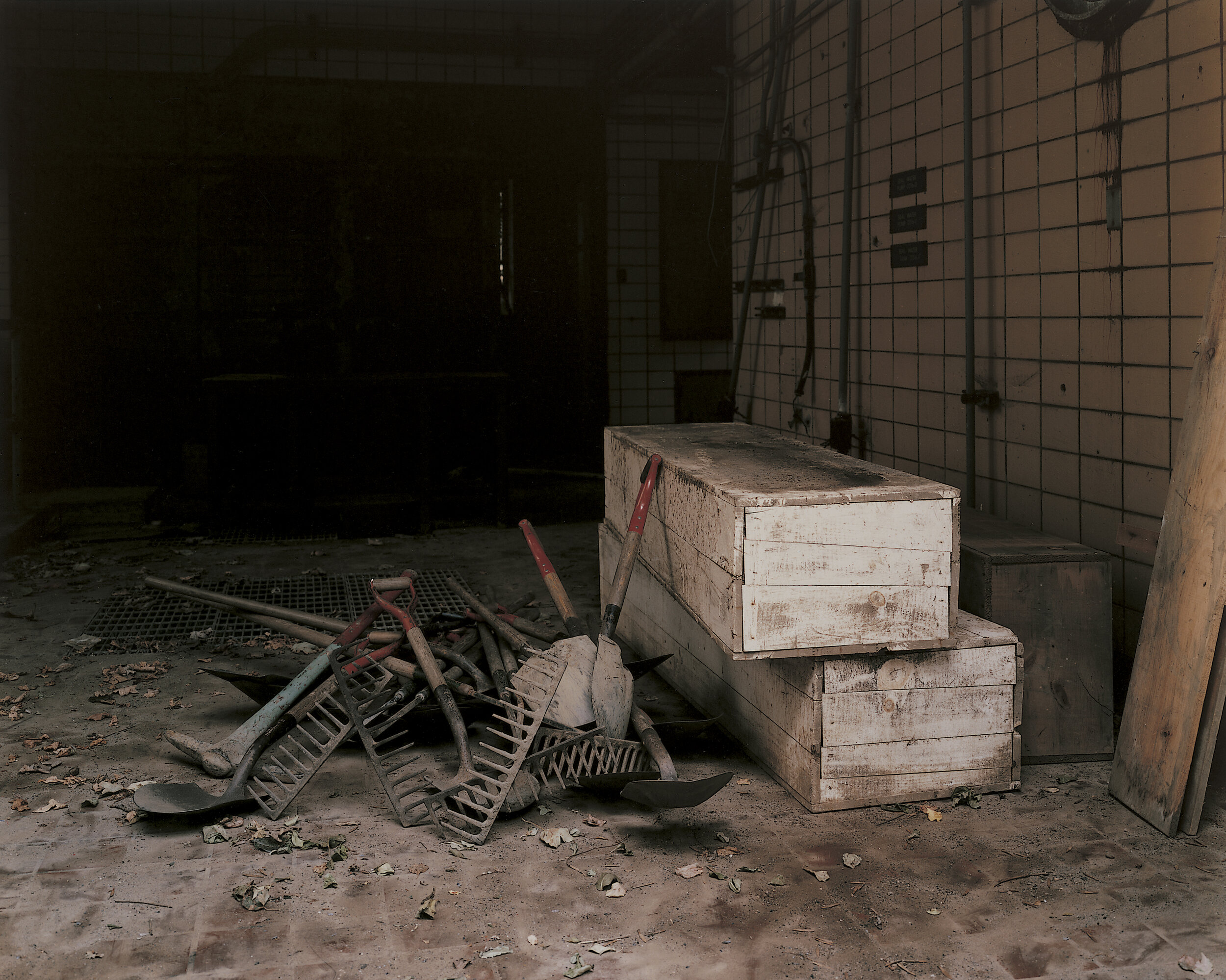 Burial implements being stored in the workhouse shower room, November 1992