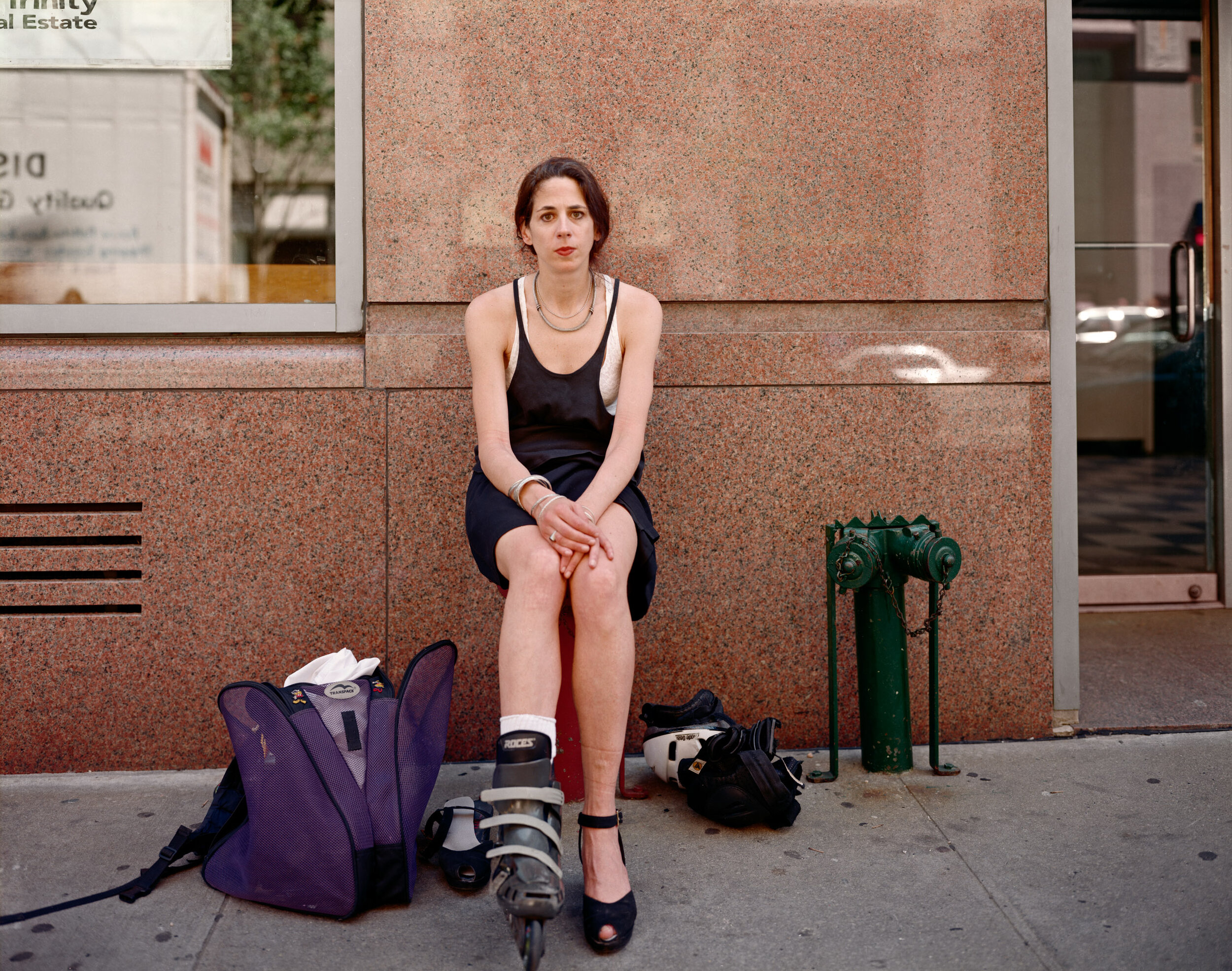 A Woman Changing for a Business Meeting, New York, New York, July 1997