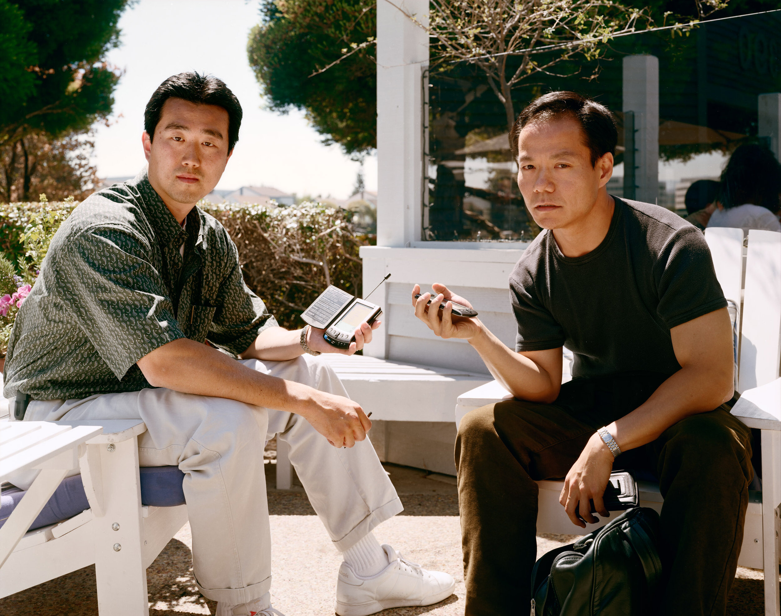 Two Men Comparing Palm Pilots, Redwood City, California, August 2000