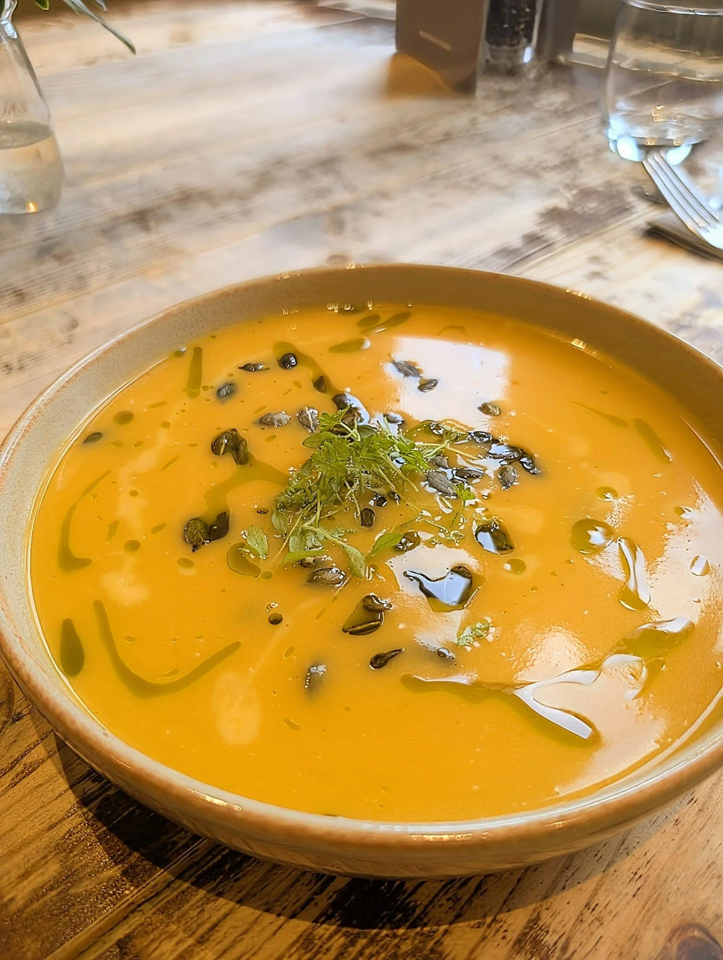 Savour the delightful combination of pumpkin and roasted garlic, drizzled with aromatic parsley oil. 
Crunchy roasted pumpkin seeds add a perfect finishing touch to this autumnal soup! 
#PumpkinSoup  #AutumnRecipes  #SoupSeason #ComfortFood #Stanto