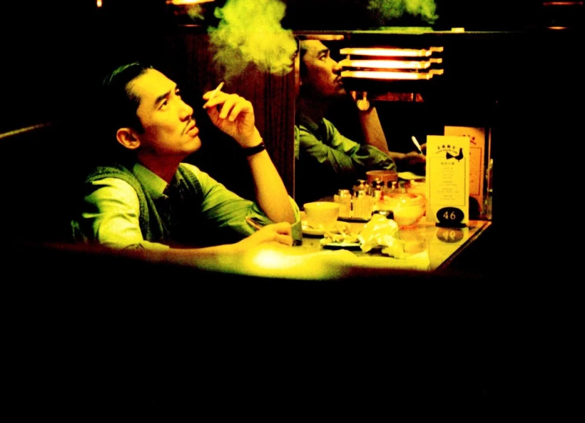 圖片說明:電影《2046》劇照,戲中梁朝偉飾演的作家周慕雲是以劉以鬯作藍本