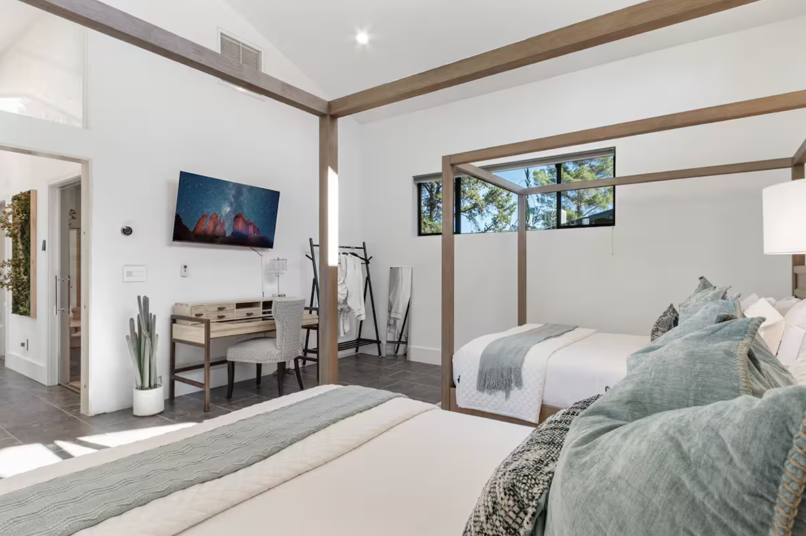 bedroom 6 - 2 queen canopy beds.png