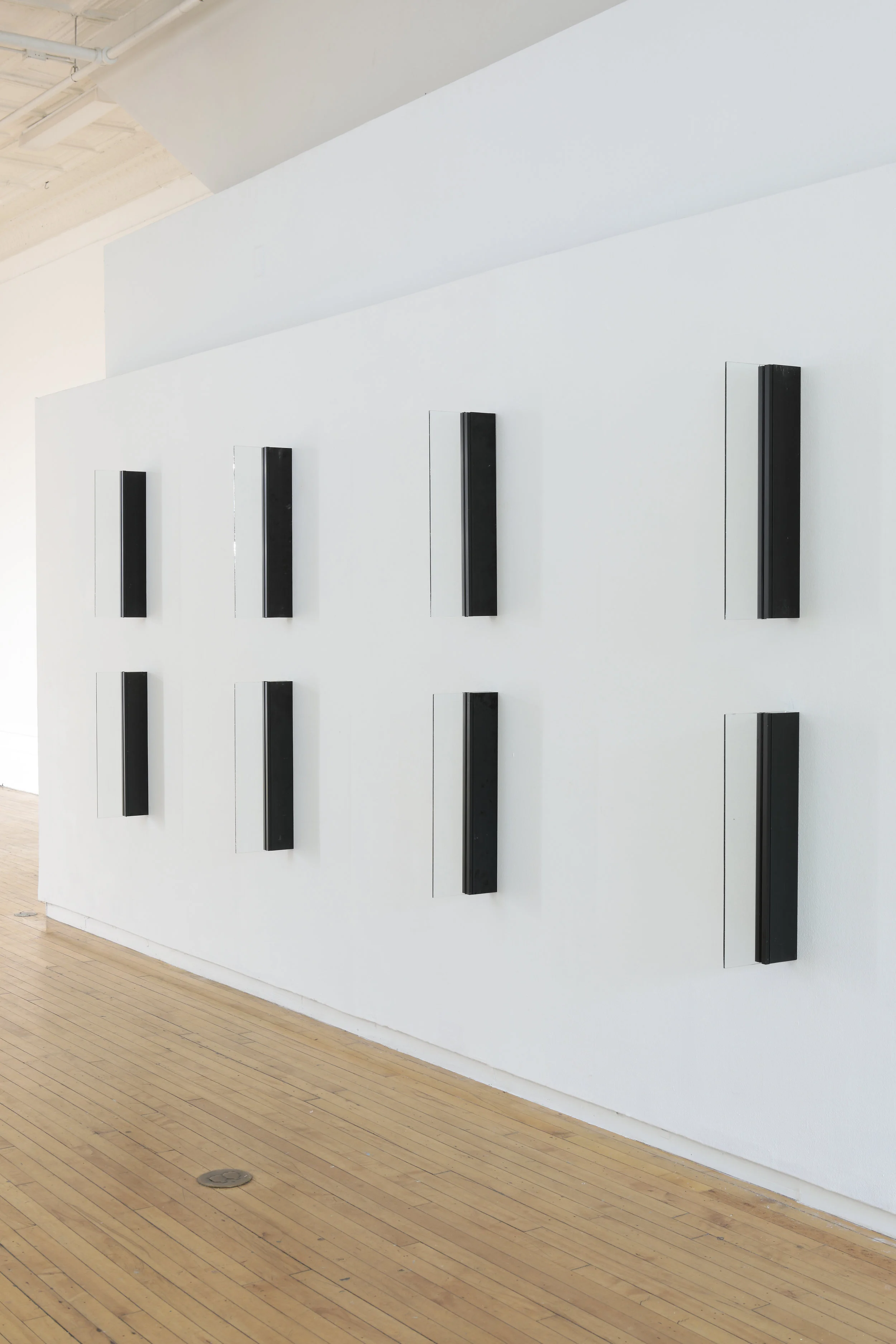 Alan Ruiz, WS-E1 - 8, 2019. 1708 installation, Aluminum, hardware, glass, rubber. Each unit 8.5 x 1.75 x 24 in./ dimensions variable. Courtesy of the Artist and 1708 Gallery. Photograph by David Hale