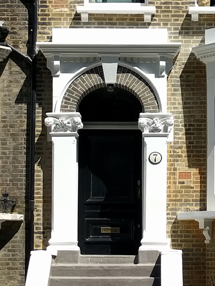  Entrance with restored architectural features 