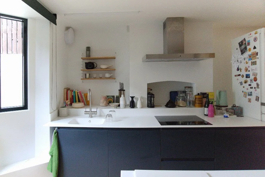 Kitchen from Magnet towards bay window to street.