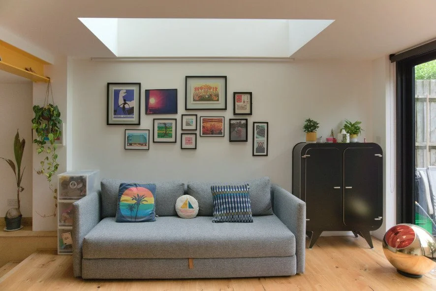 Lounge area under sky light in side return extension.