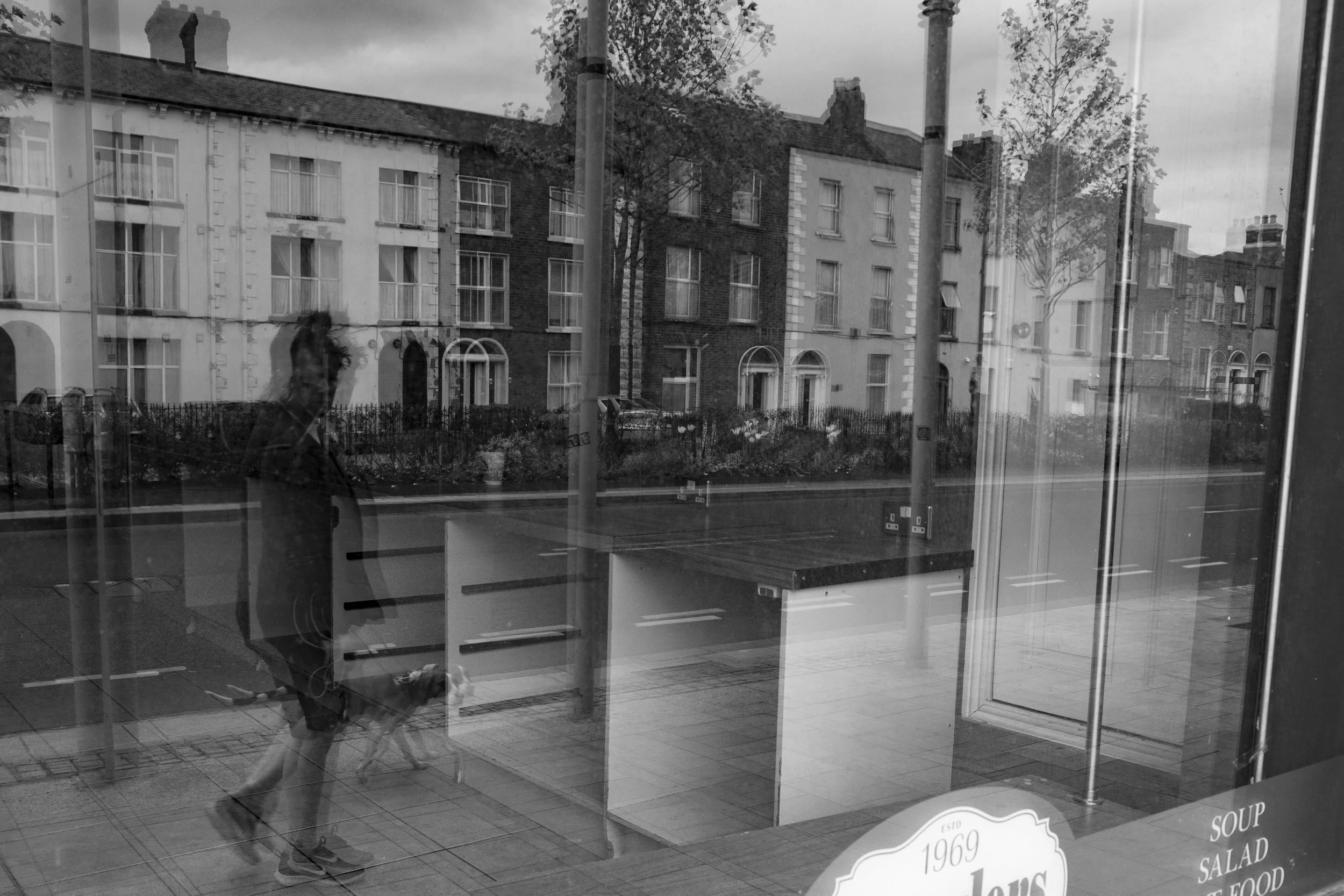 Women's reflection in shop window.jpg