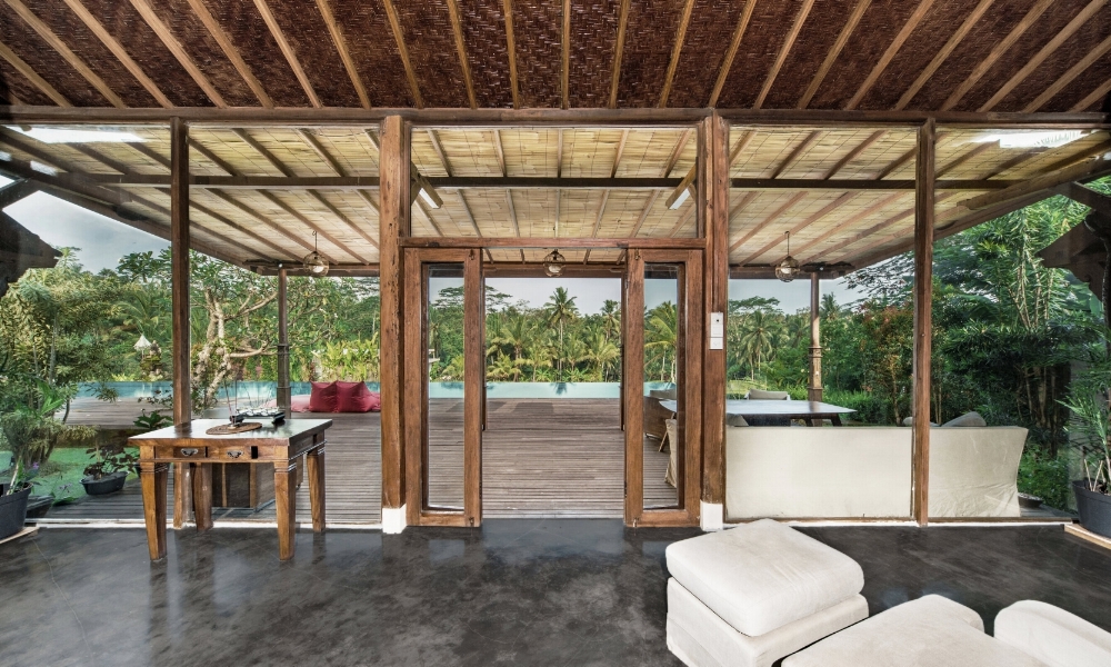 Main House living room opens onto the deck