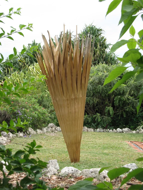 Large palm leaf trumpet (reinforced version), double leaf construction with split rattan interior and exterior ribs and reinforcement with palm fiber and sponge, sealed with oils and resins, 67" L x 16" largest diameter.