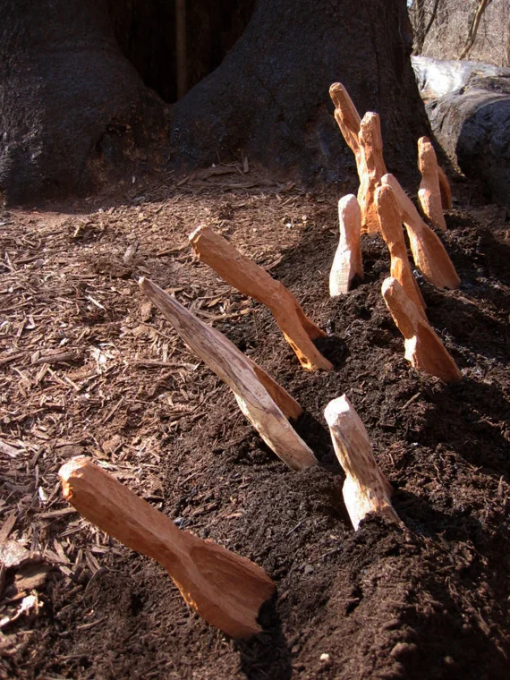 Detail, scoops awaiting use in planting at dedication ceremony and given as gifts to participants, carved by Matthew Dehaemers, each scoop, approximately 12 x 4 x 3"