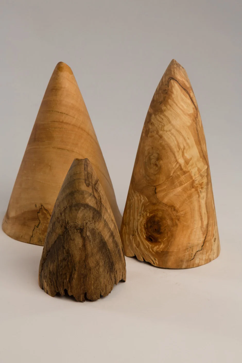 L-R, Cono, Maple and Garnet Lac shellac, beeswax. linseed oil, 6.75” diameter x 8” high, Bebo, Maple, beeswax. linseed oil, 3.25” diameter x 5.25” high, Malm, Maple, Elm, beeswax. linseed oil, 4.5” diameter x 8.5” high Photography: Stacey Evans
