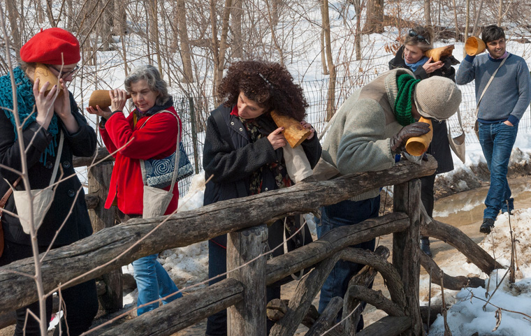  Listening to a waterfall on the Loch, Ten hand carved wooden burl trumpets used by participants, walk planned and led by Karen McCoy by invitation of the Walk Exchange, NY.&nbsp; (photo: Ian Cochran) 