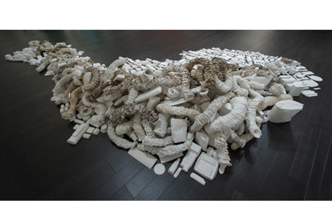 Seemingly Unconnected Events V4 2007- 2014 (ongoing) Hundreds of plaster casts of organic forms stacked and interlaced with consumer goods casts, 15 x 7 x 2.5’ Installation for Re Imagine, Three Person Exhibition, Epsten Gallery, Village Shalom, metropolitan Kansas City, 2014
Photo: E.G. Schempf