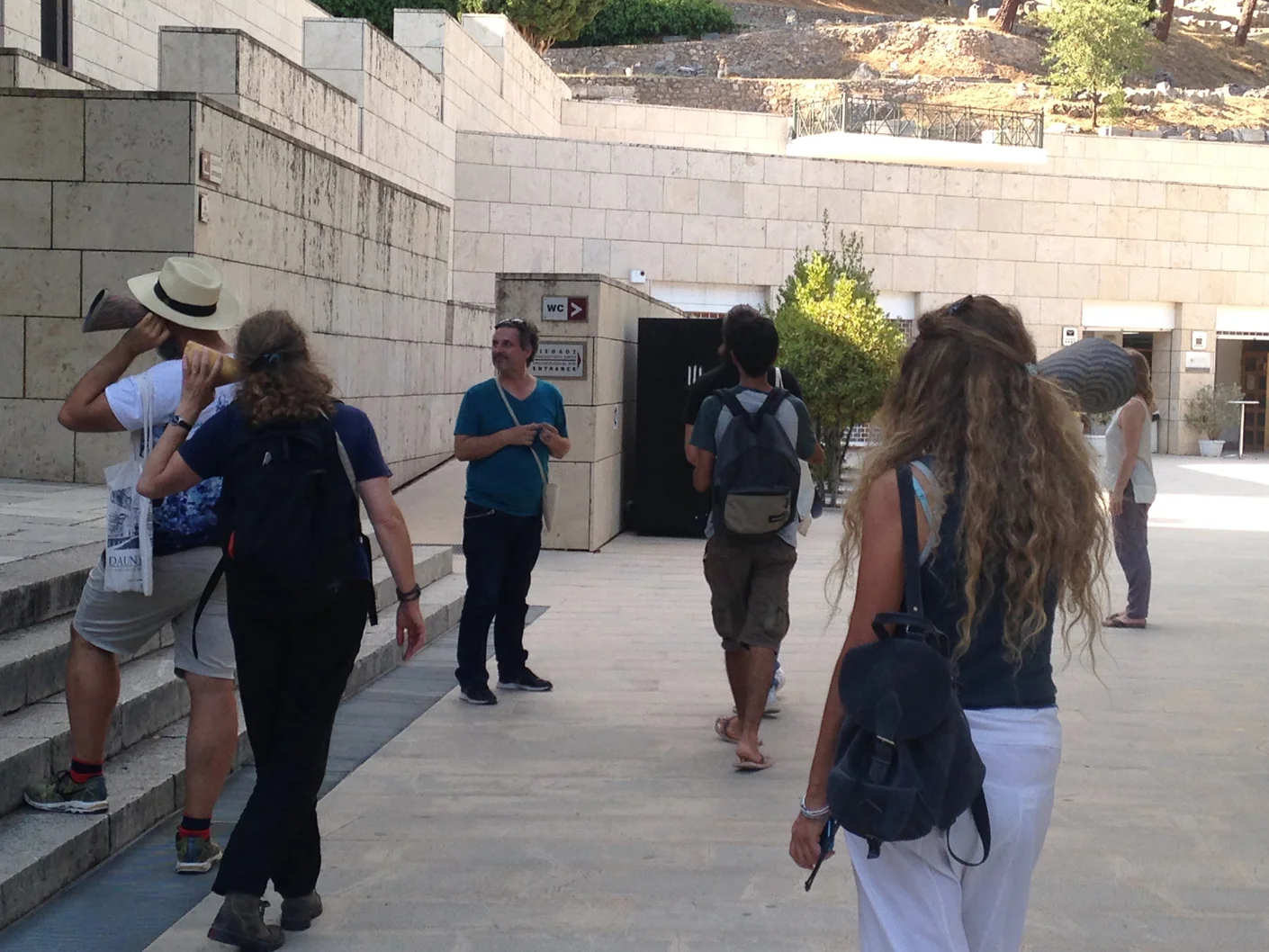 Listening in the courtyard of the archaeological museum at Delphi