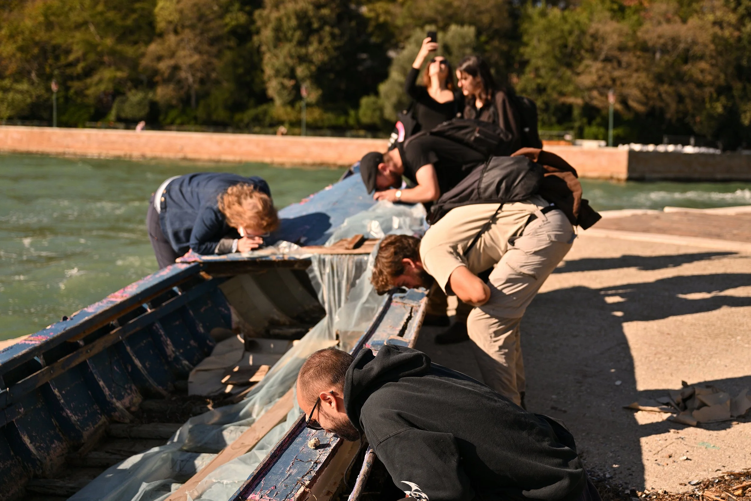 Examining the abandoned boat using the lenses