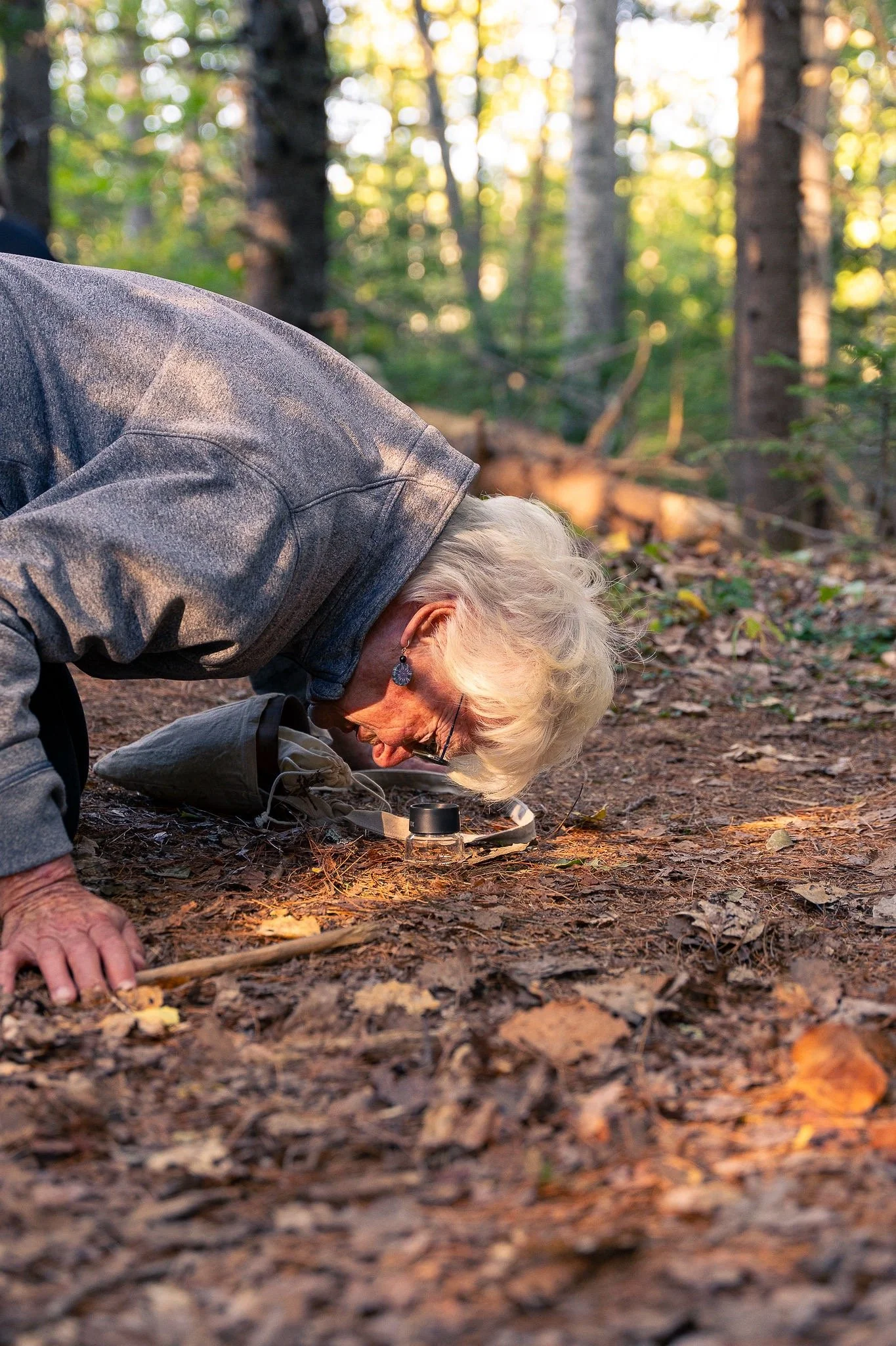  Participant observing light phenomena with the lens 