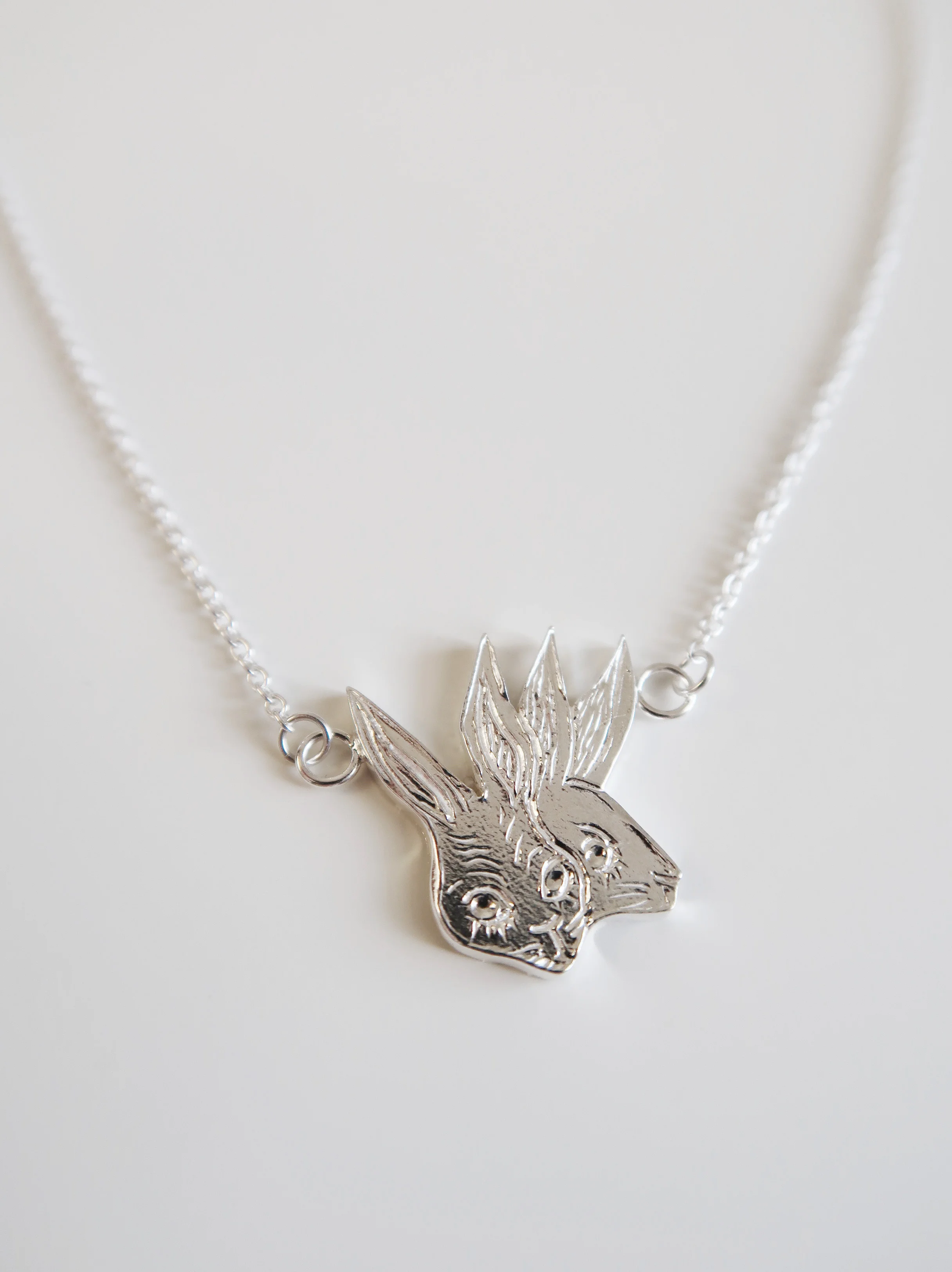 5thetwoheadedrabbitnecklace3 copy.jpg