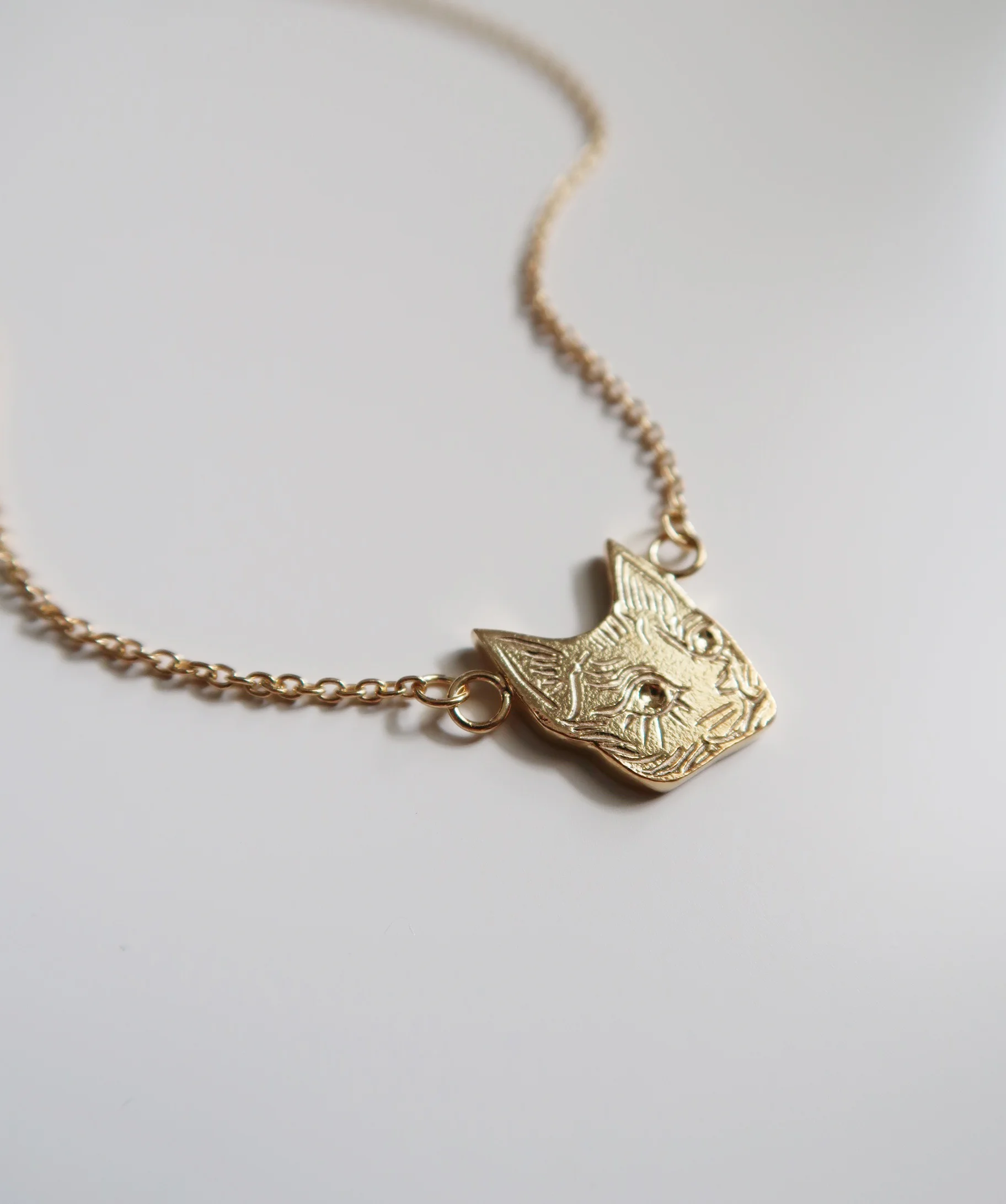 Tiny Cat Head Necklace - Gold Plated $110.00