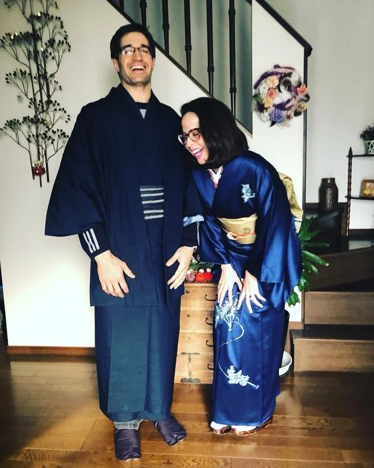 Carlo Capua wearing traditional Japanese attire with a friend in Japan