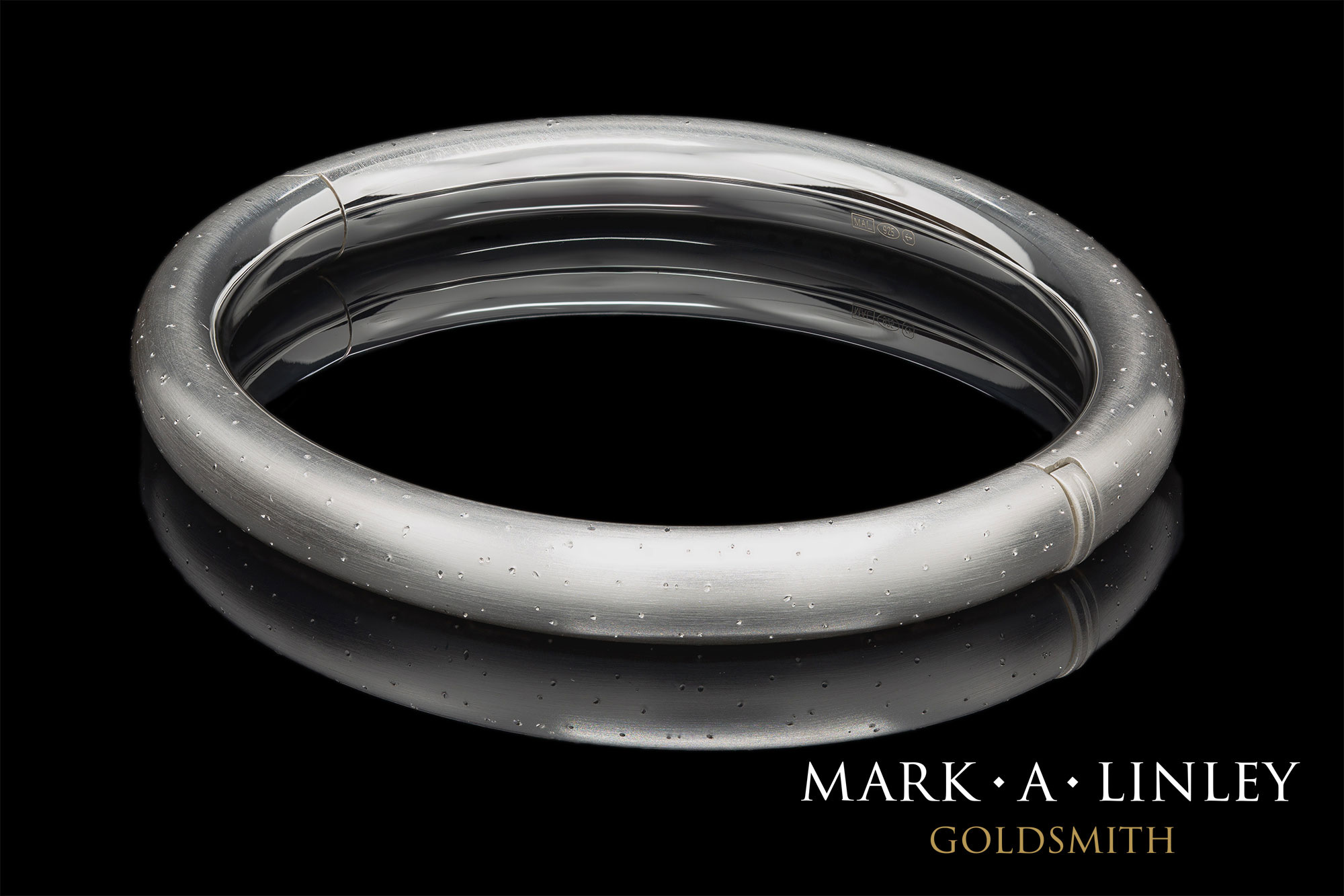 Silver-diamond-cut-bangle.jpg