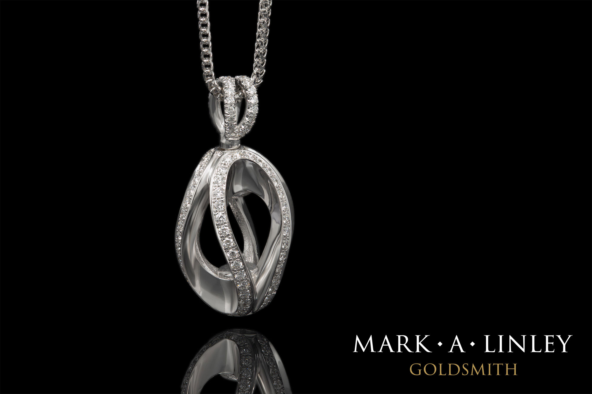 18ct-white-diamond-infinity-catch-pendant.jpg