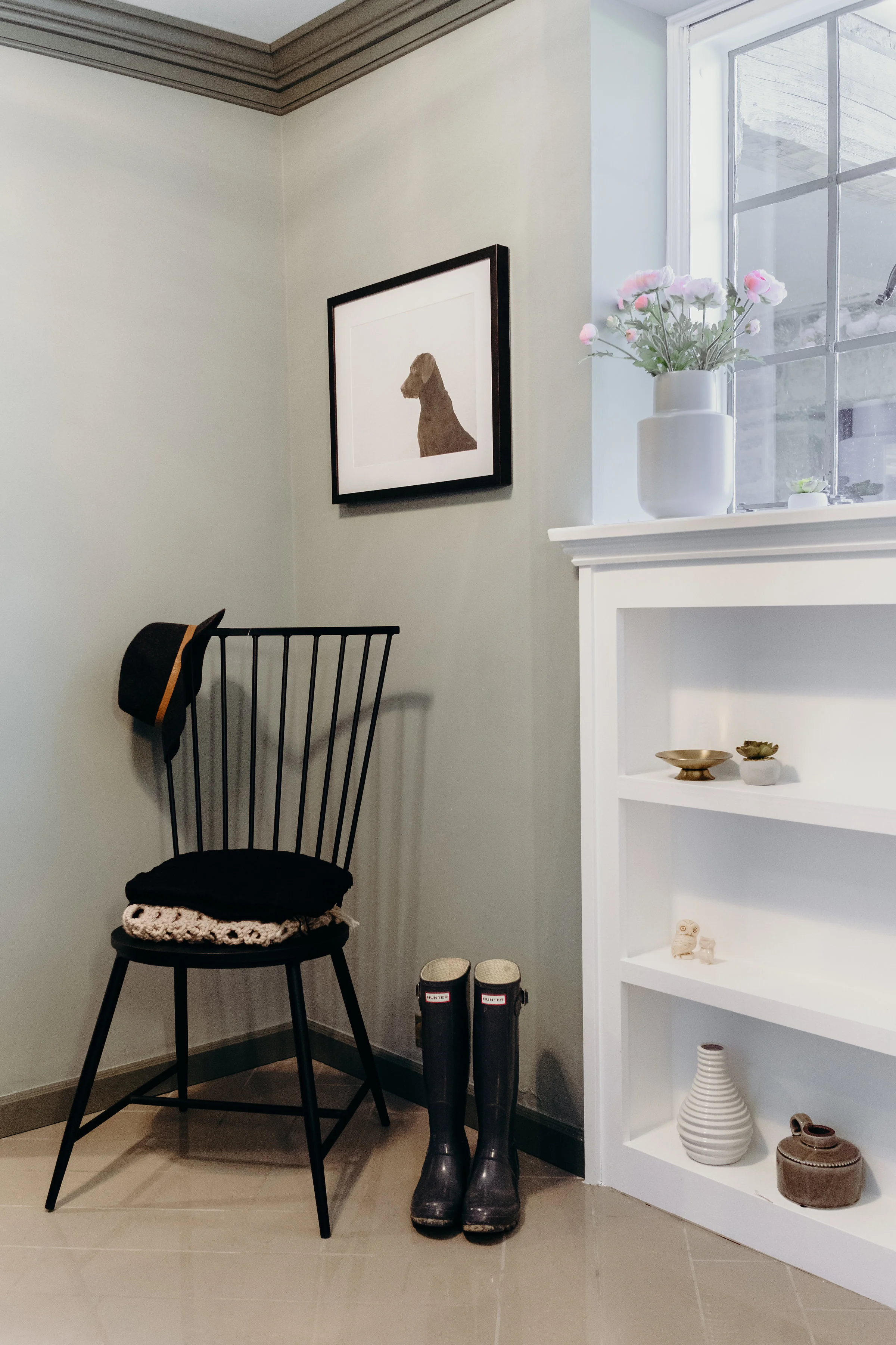 French country farmhouse mud room with herringbone floors