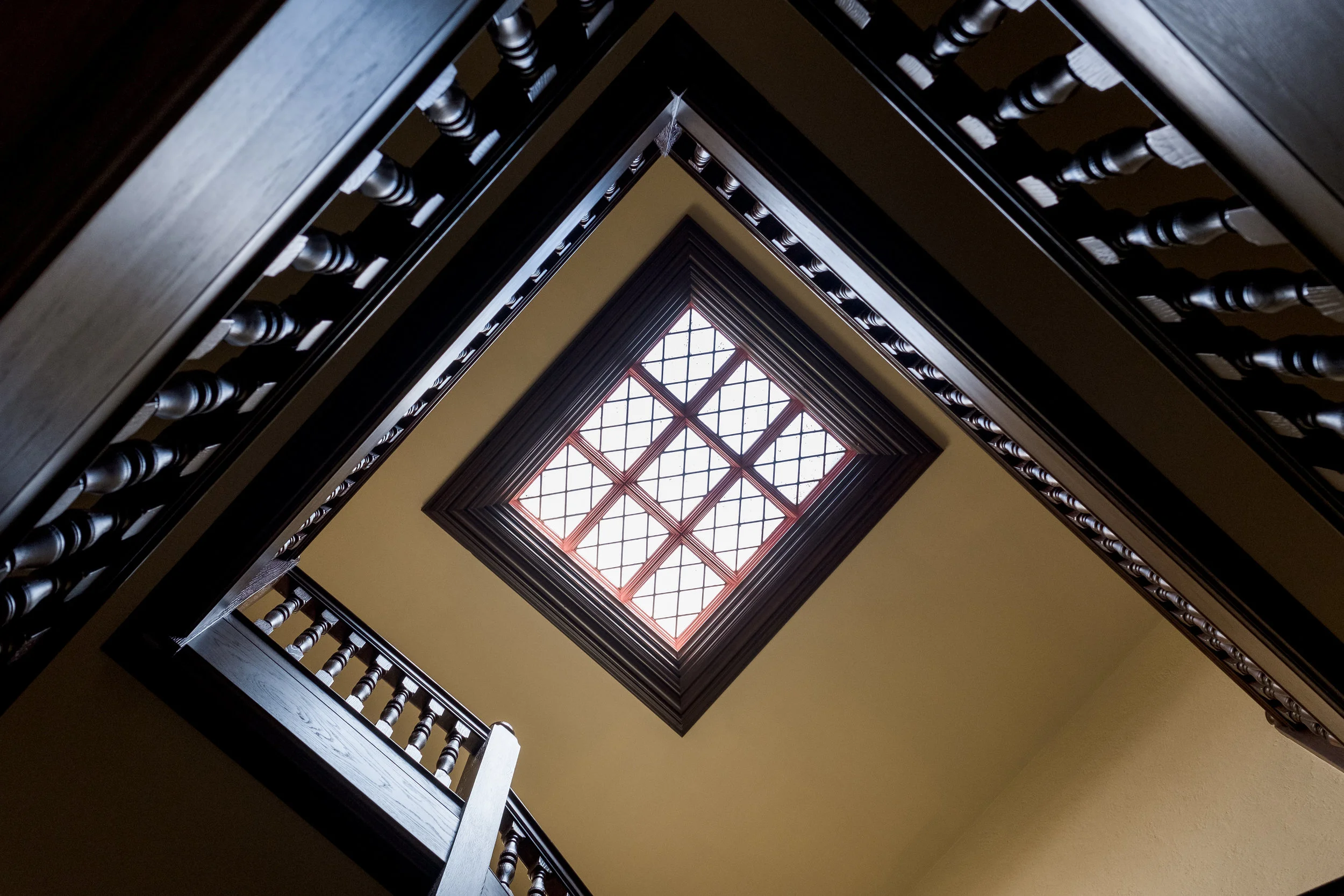 Dark wood 1920's staircase.