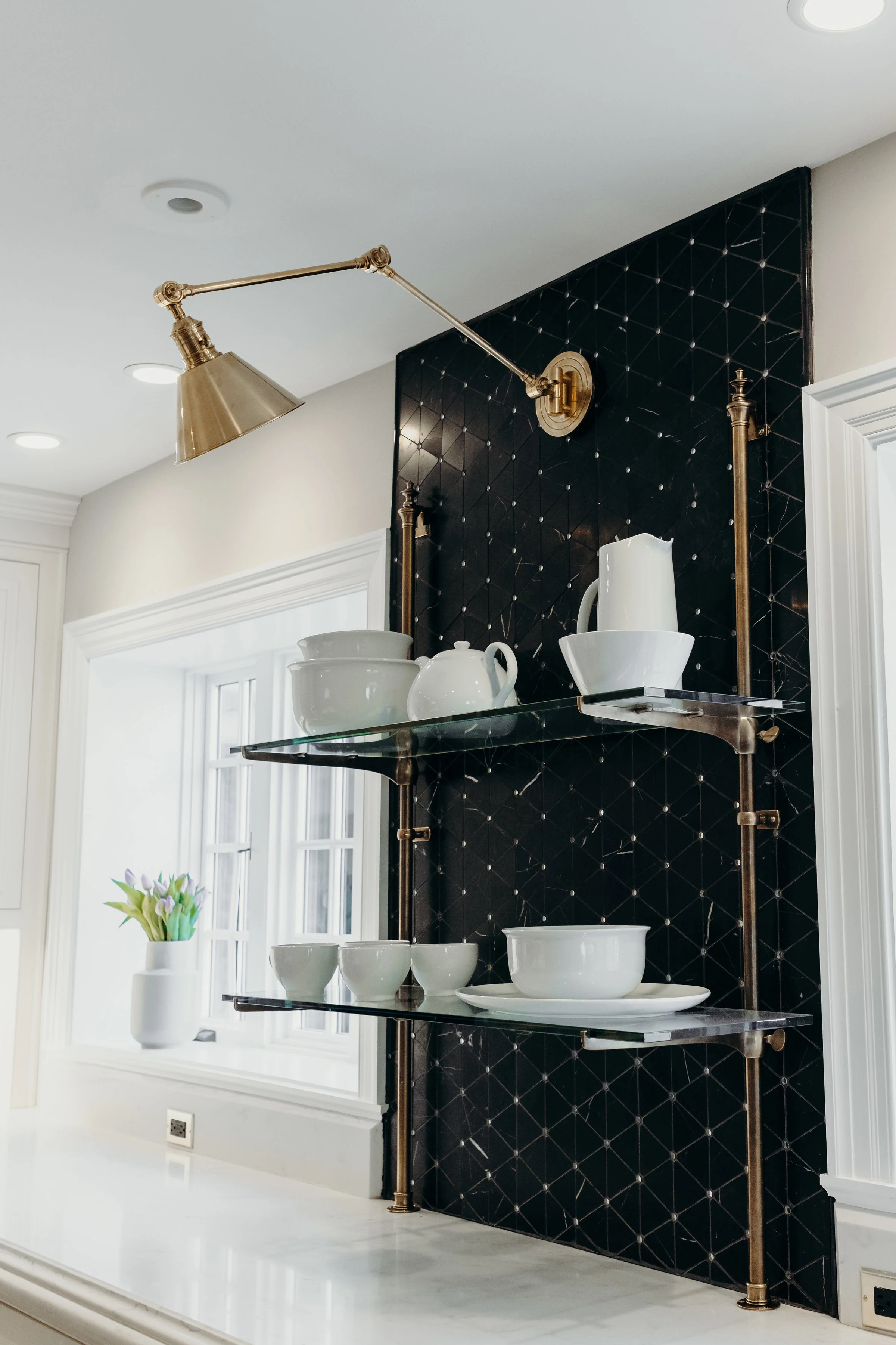 French country cottage kitchen with black tile backsplash